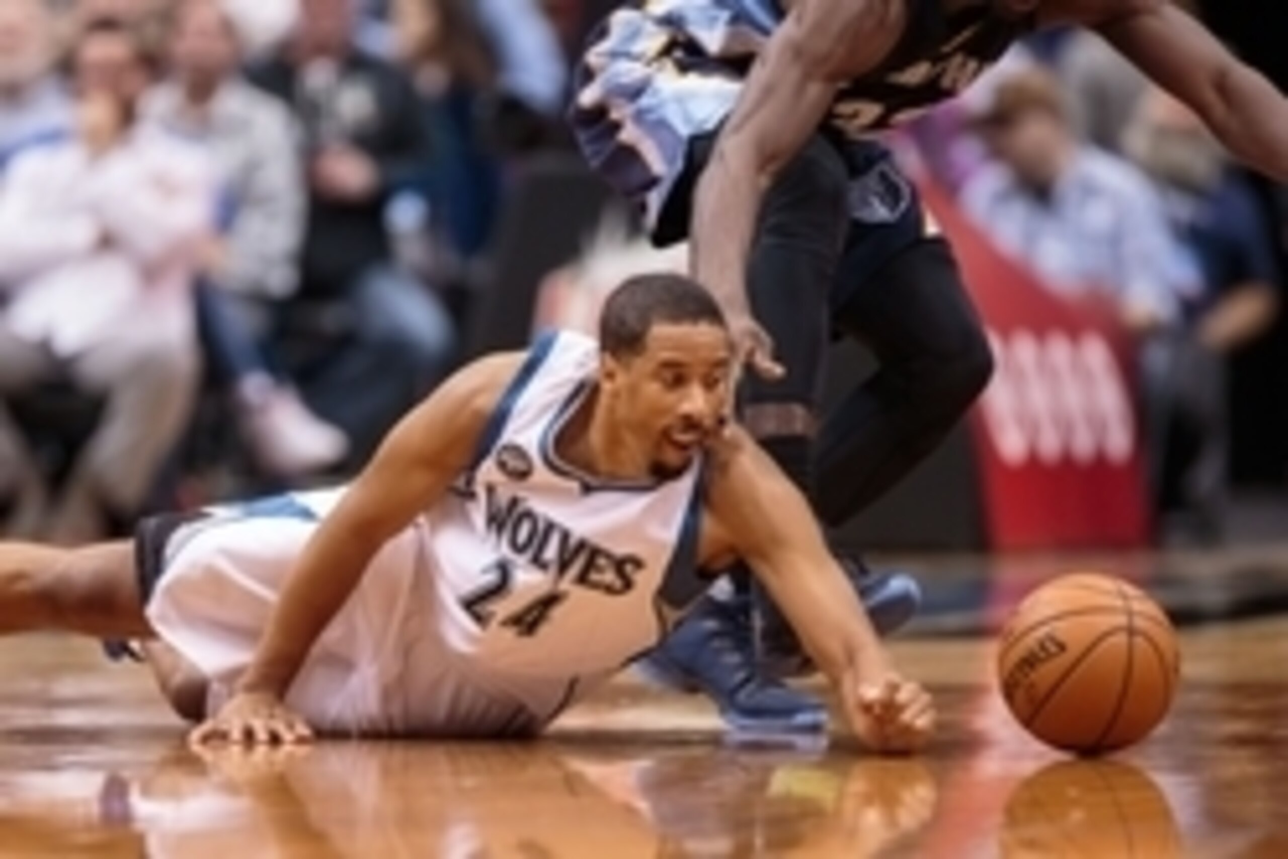 Nov 15, 2015; Minneapolis, MN, USA; Minnesota Timberwolves guard Andre Miller (24) dives for a loose ball in the fourth quarter against the Memphis Grizzlies at Target Center. The Grizzlies won 114-106. Mandatory Credit: Brad Rempel-USA TODAY Sports