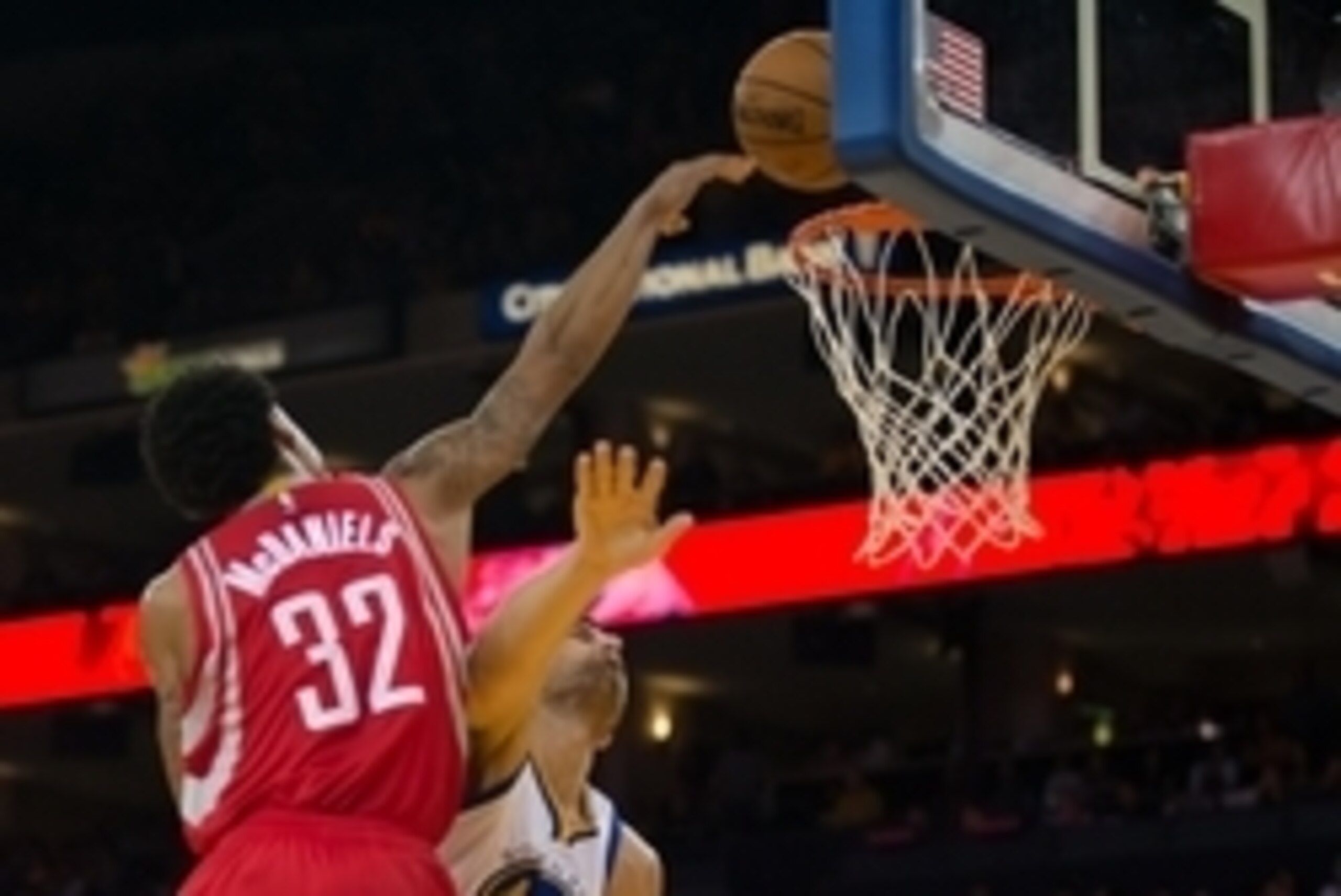 Oct 15, 2015; Oakland, CA, USA; Houston Rockets guard K.J. McDaniels (32) dunks the ball against Golden State Warriors center Andrew Bogut (12) during the second quarter at Oracle Arena. Mandatory Credit: Kelley L Cox-USA TODAY Sports