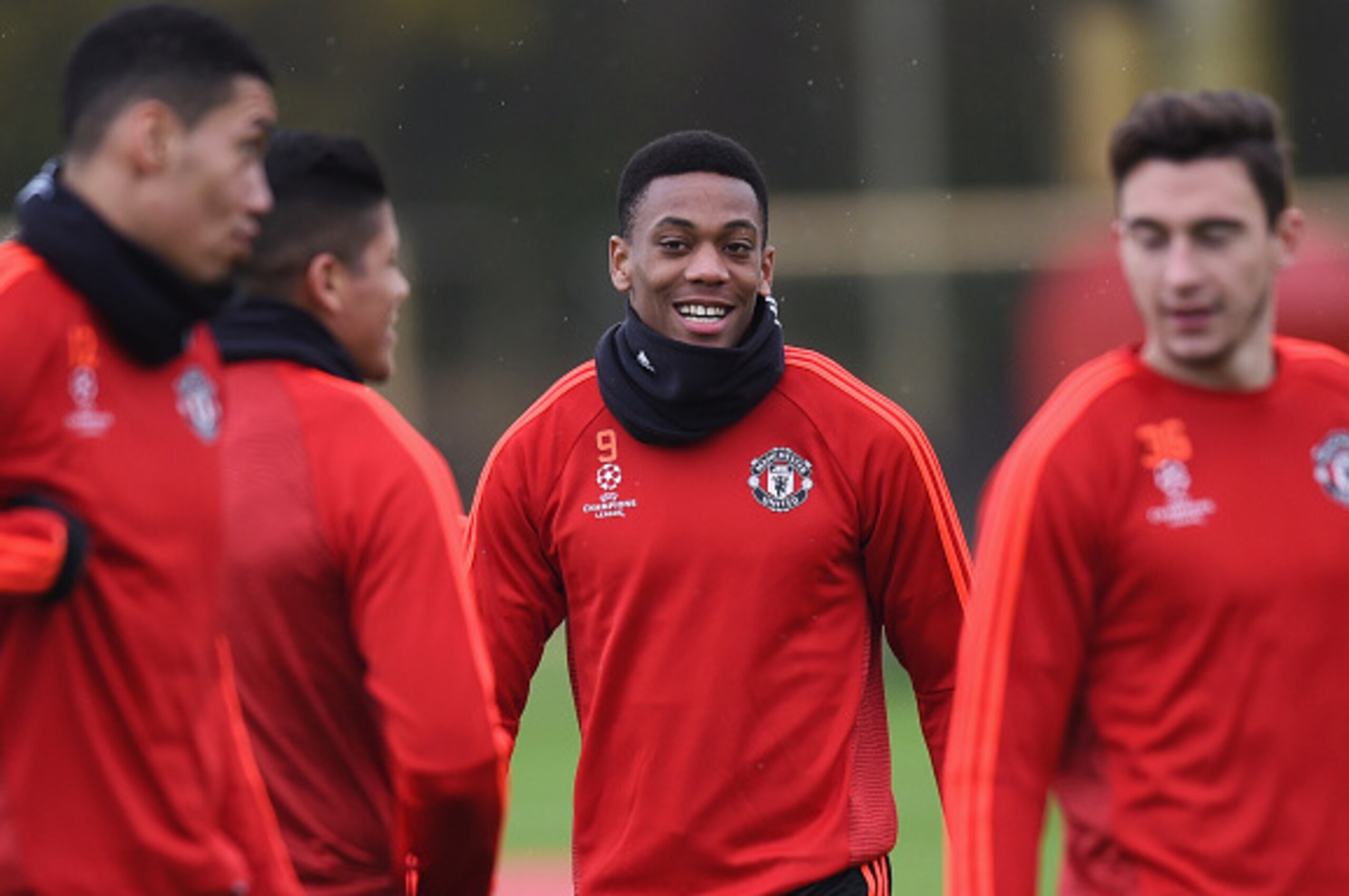 MANCHESTER, ENGLAND - NOVEMBER 24:  Anthony Martial (C) smiles alongside team mates during the Manchester United training session on the eve of the UEFA Champions League Group B match against PSV Eindhoven at Aon Training Complex on November 24, 2015 in M