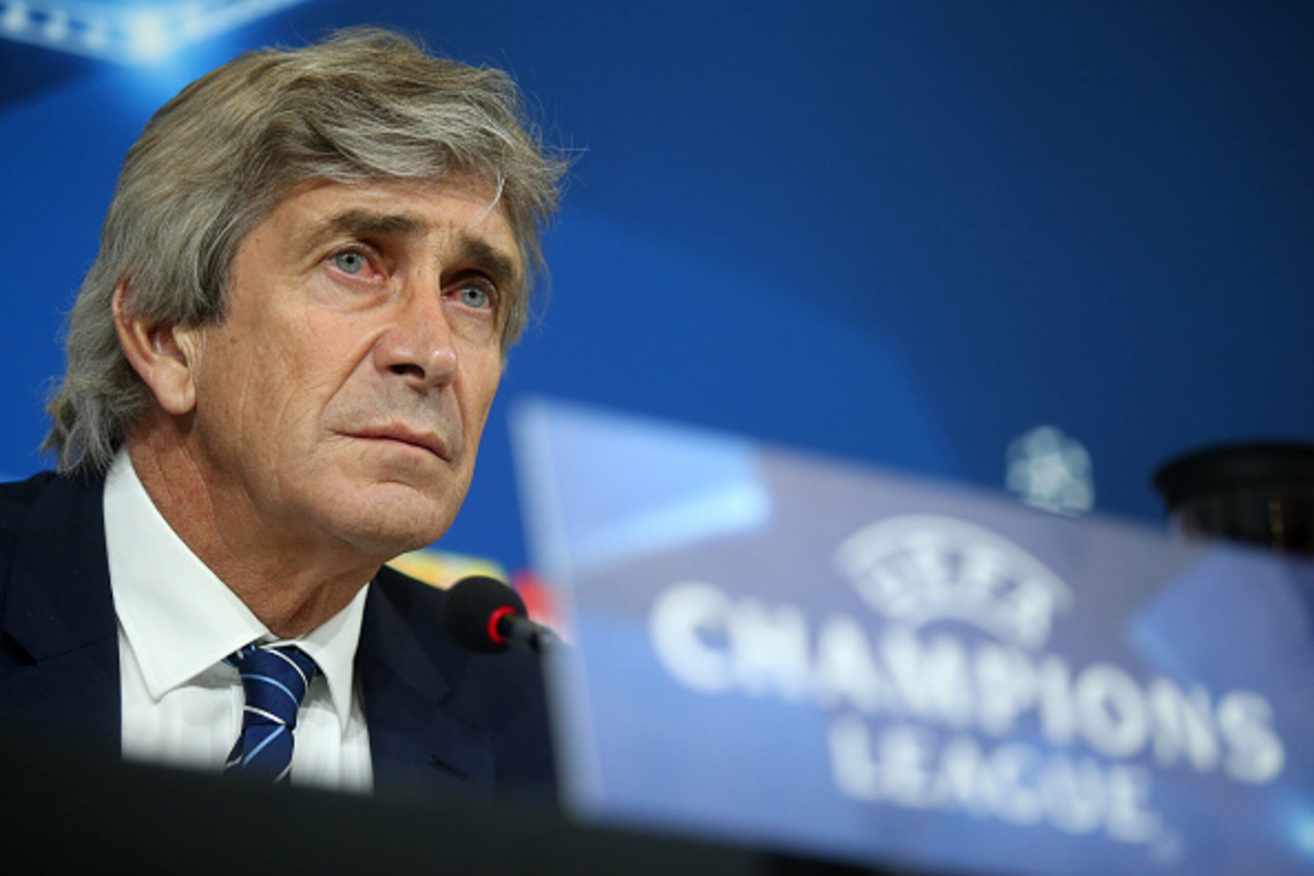 Manchester City's Chilean coach Manuel Pellegrini looks on during a press conference at the 'Juventus Stadium' in Turin on November 24, 2015, on the eve of the UEFA Champions League football match Juventus versus Manchester City.  AFP PHOTO / MARCO BERTOR