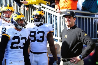 STATE COLLEGE, PA - NOVEMBER 21:  Jim Harbaugh head coach of the Michigan Wolverines looks on prior to the game against the Penn State Nittany Lions at Beaver Stadium on November 21, 2015 in State College, Pennsylvania.  (Photo by Evan Habeeb/Getty Images