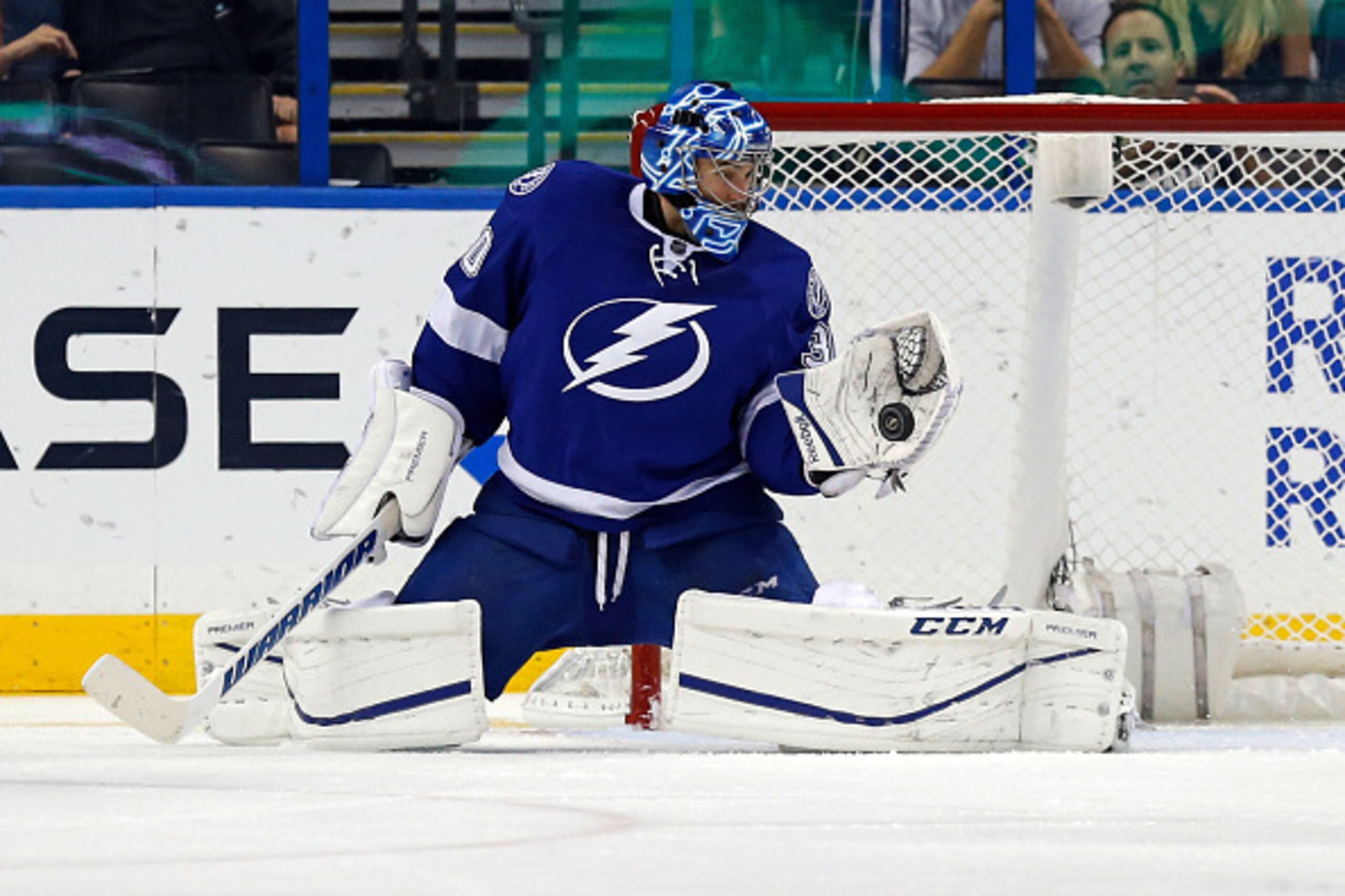 TAMPA, FL - NOVEMBER 12: Ben Bishop #30 of the Tampa Bay Lightning makes a save against the Calgary Flames at the Amalie Arena on November 12, 2015 in Tampa, Florida. (Photo by Mike Carlson/Getty Images)