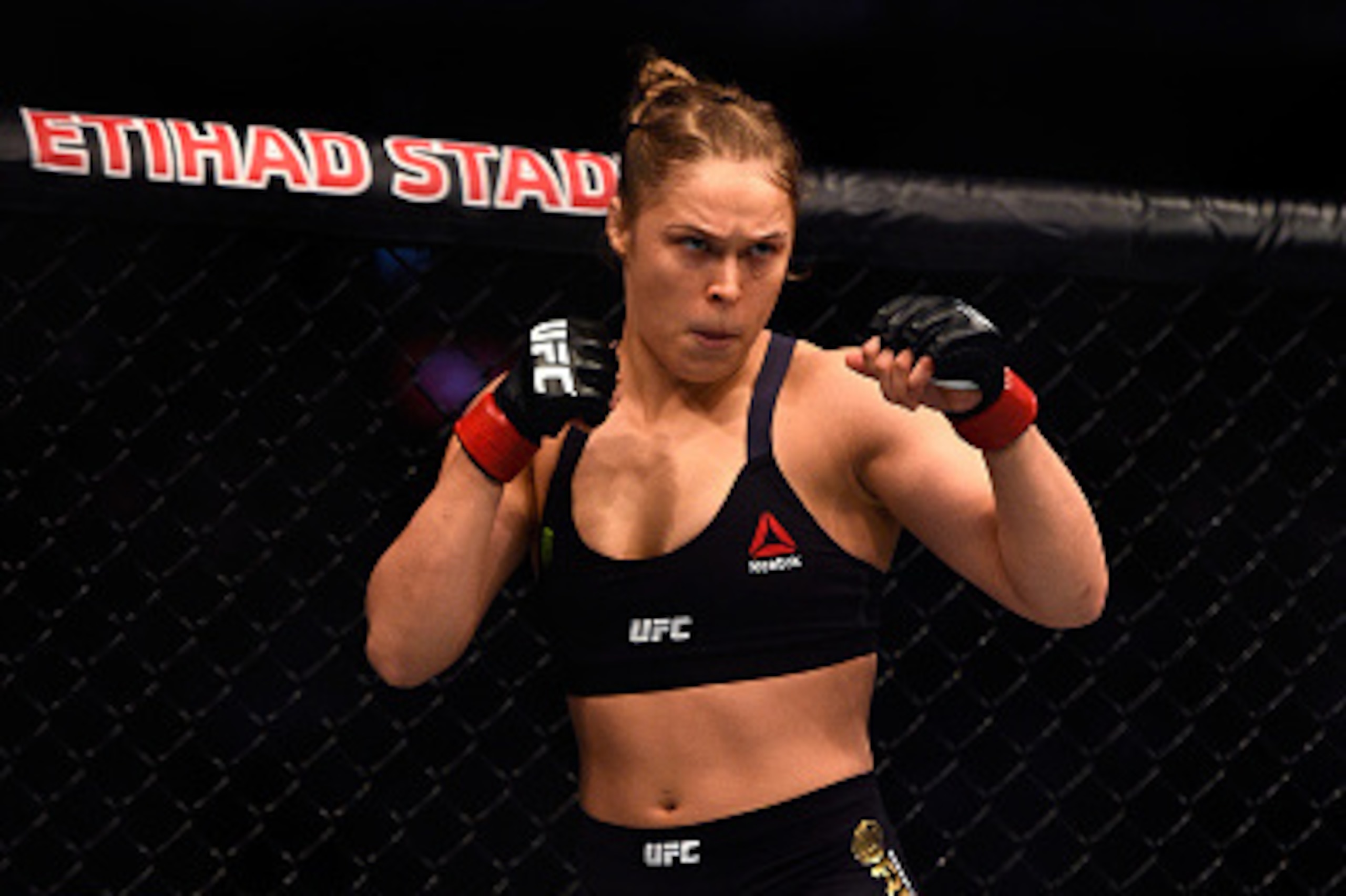 MELBOURNE, AUSTRALIA - NOVEMBER 15:  Ronda Rousey waits in her corner before facing Holly Holm in their women's bantamweight championship bout during the UFC 193 event at Etihad Stadium on November 15, 2015 in Melbourne, Australia. (Photo by Jeff Bottari/
