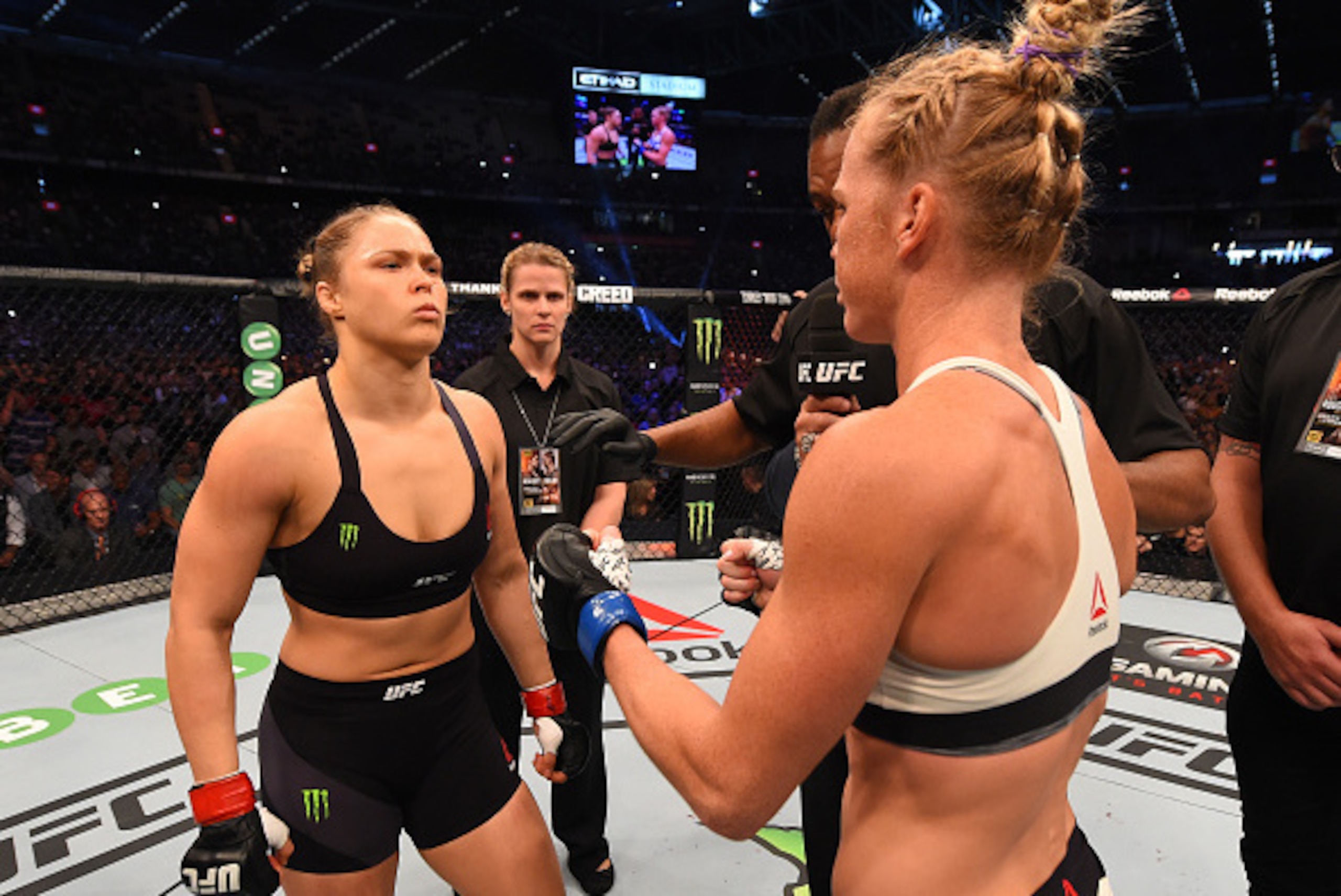 MELBOURNE, AUSTRALIA - NOVEMBER 15:  (L-R) UFC women's bantamweight champion Ronda Rousey of the United States refuses to touch gloves with opponent Holly Holm of the United States before their UFC women's bantamweight championship bout during the UFC 193
