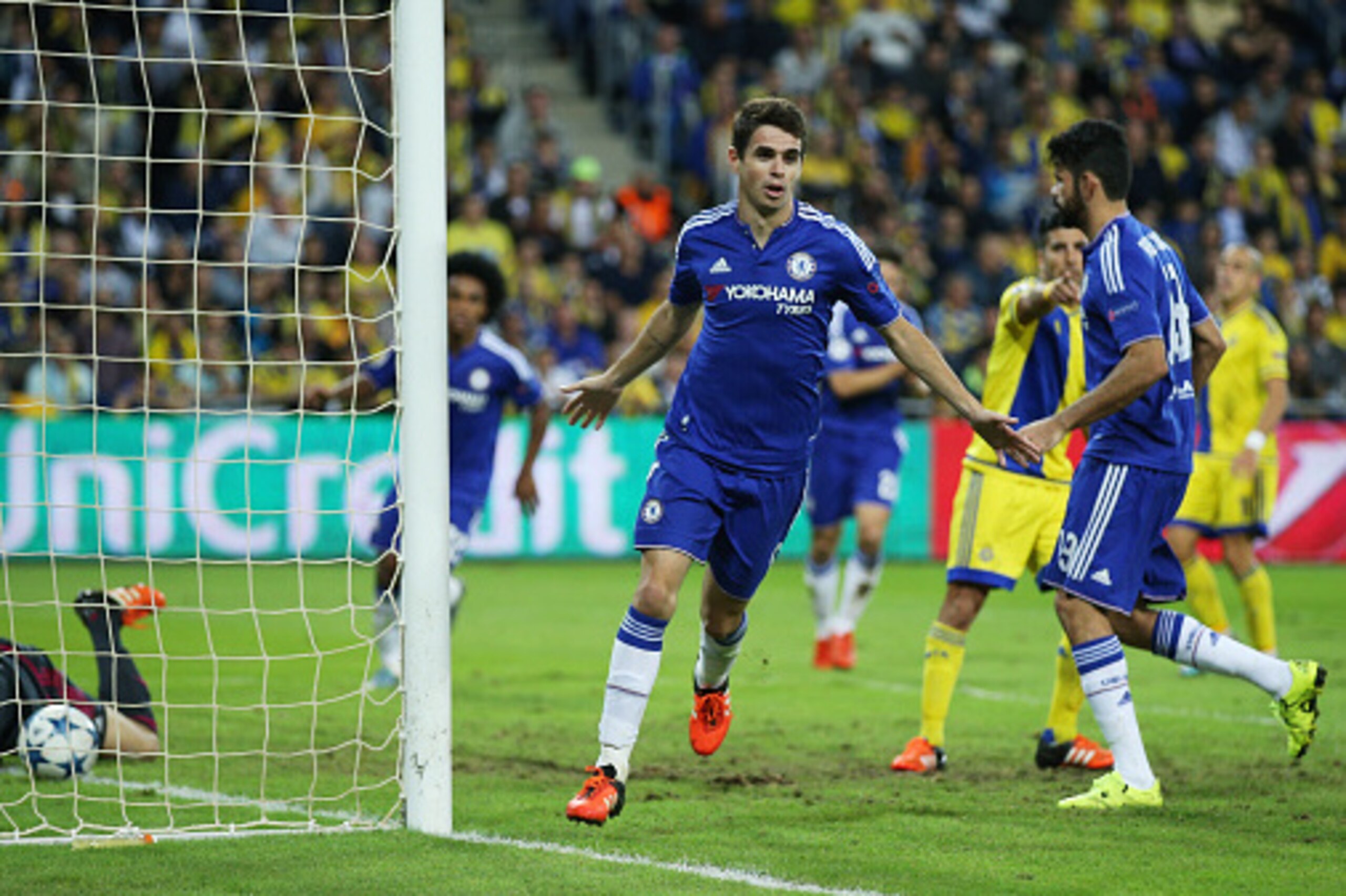 HAIFA, ISRAEL - NOVEMBER 24: Oscar of Chelsea celebrates scoring his teams third goal during the UEFA Champions League Group G match between Maccabi Tel-Aviv FC and Chelsea FC at Sammy Ofer Stadium on November 24, 2015 in Haifa, Israel.  (Photo by Ian Wal