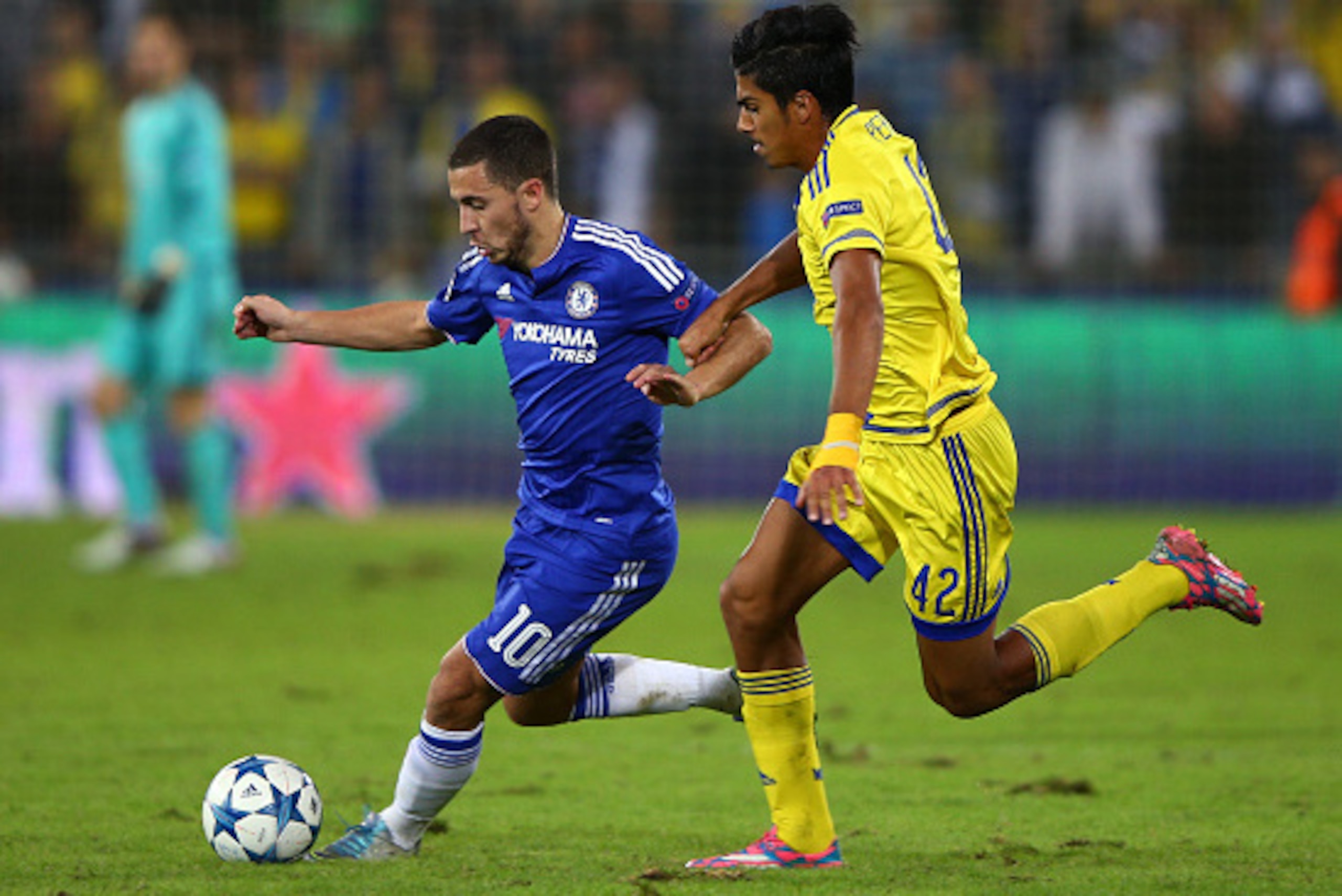 HAIFA, ISRAEL - NOVEMBER 24: Eden Hazard of Chelsea takes on Dor Peretz of Maccabi Tel-Aviv during the UEFA Champions League Group G match between Maccabi Tel-Aviv FC and Chelsea FC at Sammy Ofer Stadium on November 24, 2015 in Haifa, Israel.  (Photo by I