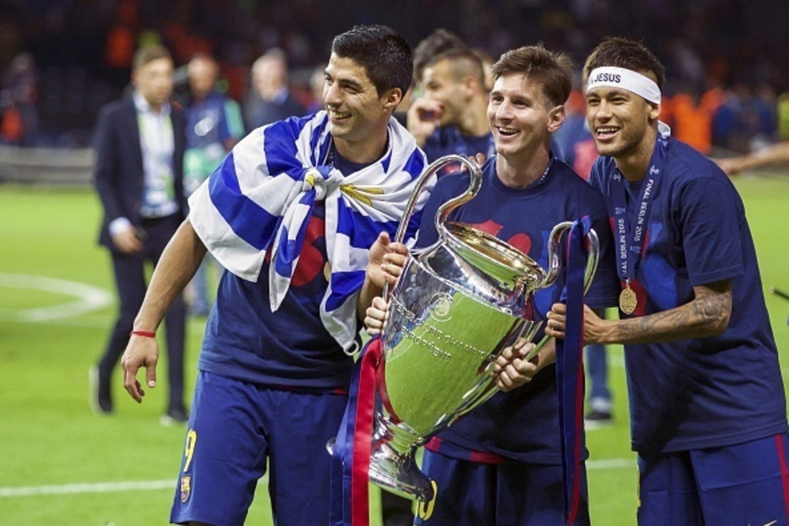 (L-R) Luis Suarez of FC Barcelona, Lionel Messi of FC Barcelona, Neymar of FC Barcelona with trophy during the UEFA Champions League  final match between Barcelona and Juventus on June 6, 2015 at the Olympic stadium in Berlin, Germany.(Photo by VI Images 