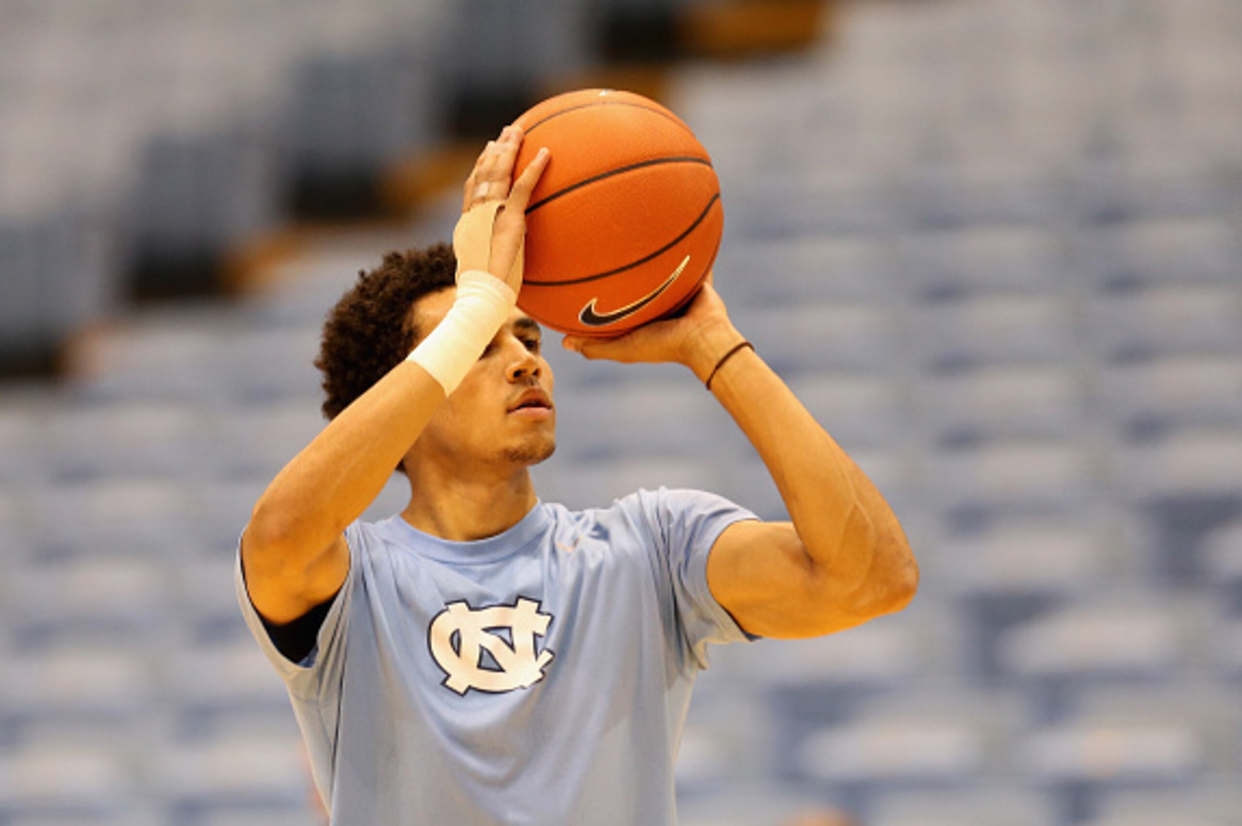 CHAPEL HILL, NC - NOVEMBER 18:  Marcus Paige #5 of the North Carolina Tar Heels warms up, with his injured wrist, before their game against the Wofford Terriers at Dean Smith Center on November 18, 2015 in Chapel Hill, North Carolina.  (Photo by Streeter 