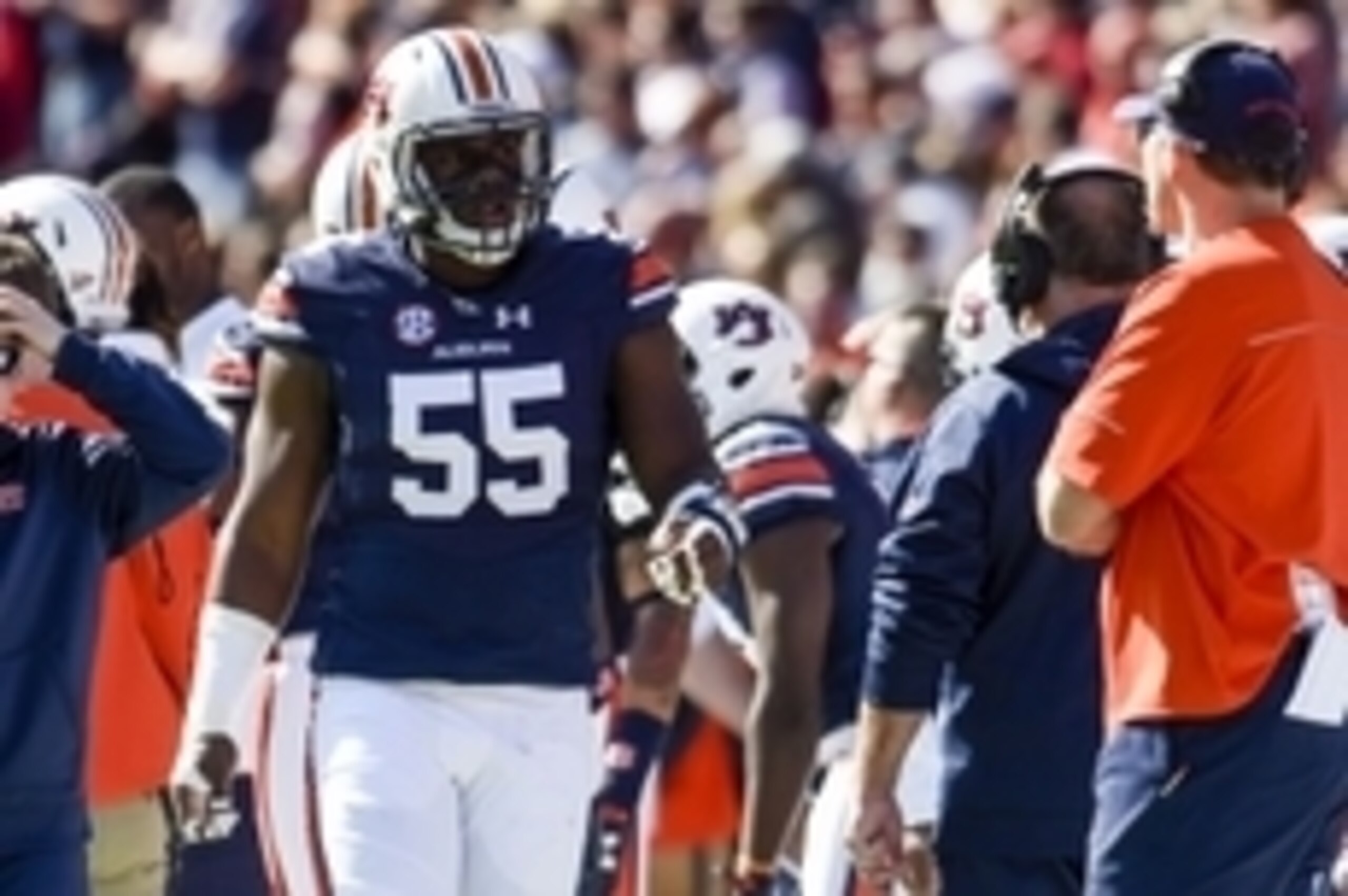 Nov 14, 2015; Auburn, AL, USA; Auburn Tigers defensive lineman Carl Lawson (55) walks on the sidelines during the first quarter against the Georgia Bulldogs at Jordan Hare Stadium. Mandatory Credit: Shanna Lockwood-USA TODAY Sports