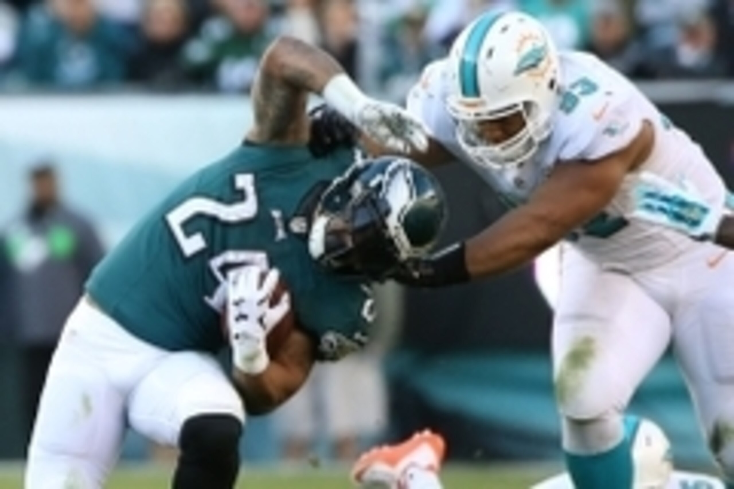 Nov 15, 2015; Philadelphia, PA, USA; Miami Dolphins defensive tackle Ndamukong Suh (93) tackles Philadelphia Eagles running back Ryan Mathews (24) during the second half at Lincoln Financial Field. Mandatory Credit: Jeffrey G. Pittenger-USA TODAY Sports