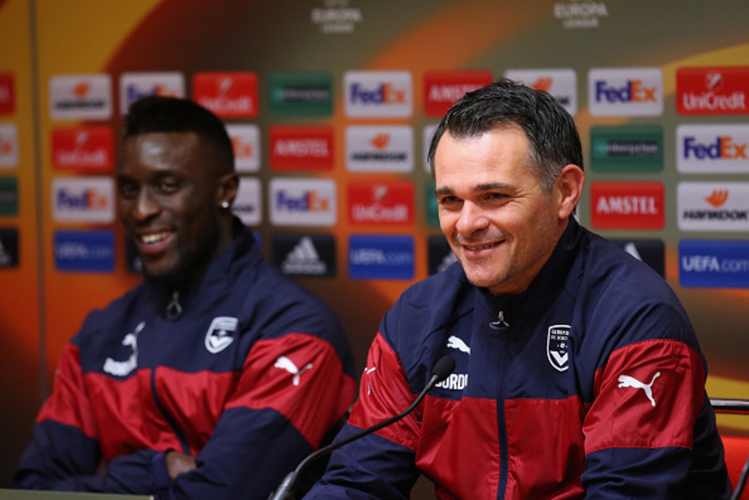 LIVERPOOL, ENGLAND - NOVEMBER 25:  Willy Sagnol the coach of FC Girondins de Bordeaux and Lamine Sane face the media during a press conference at Anfield on November 25, 2015 in Liverpool, United Kingdom.  (Photo by Alex Livesey/Getty Images)