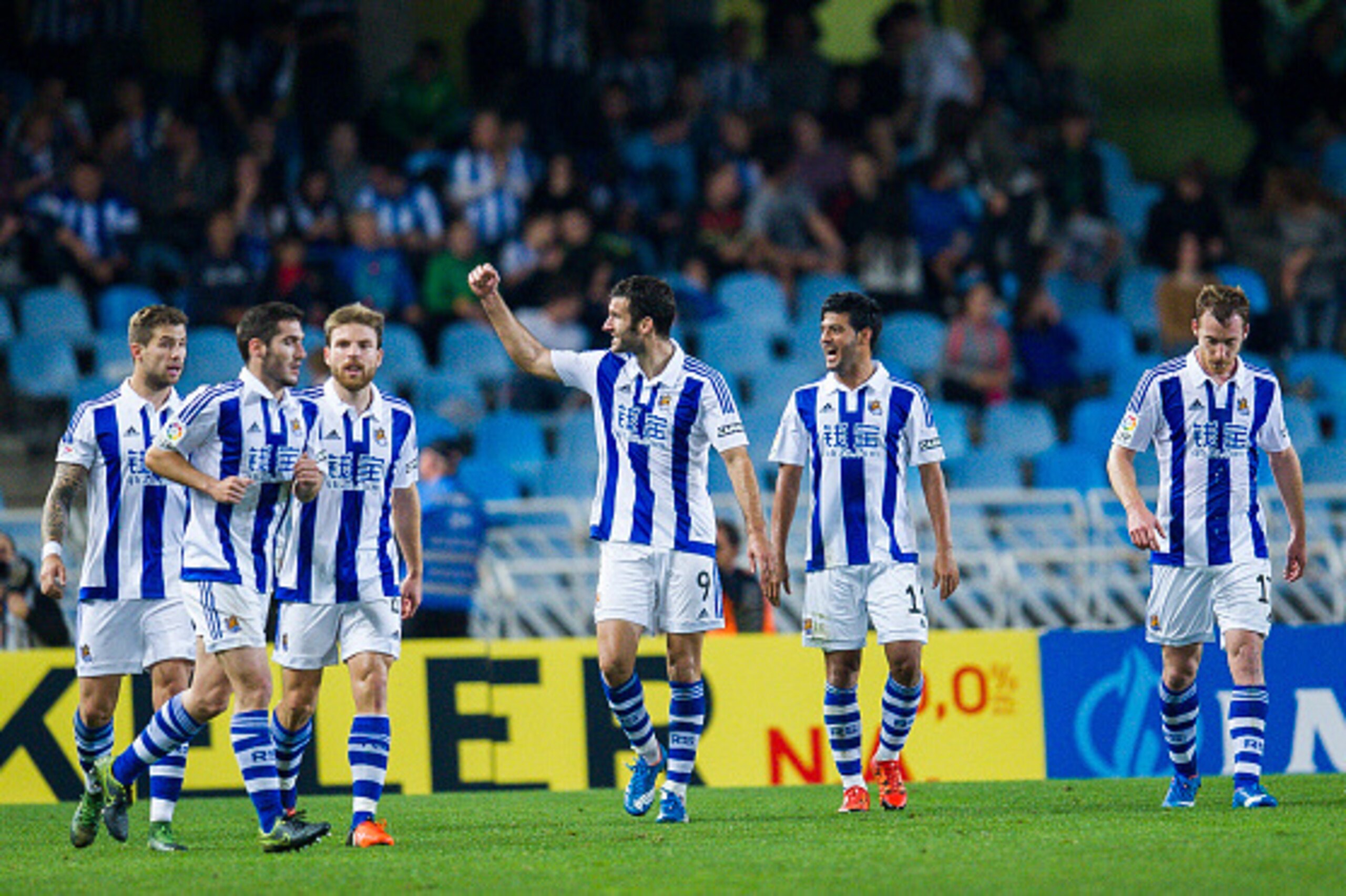 SAN SEBASTIAN, SPAIN - OCTOBER 31:  Imanol Agirretxe (C) of Real Sociedad celebrates after scoring his team's second goal during the La Liga match between Real Sociedad de Futbol and Celta de Vigo de Futbol at Estadio Anoeta on October 31, 2015 in San Seb