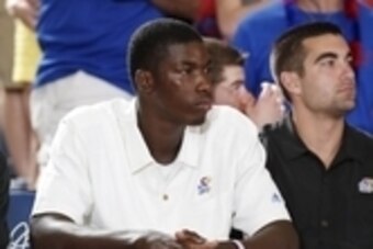 Nov 23, 2015; Lahaina, HI, USA; Kansas Jayhawks forward Cheick Diallo who is waiting to be declared eligible by the NCAA watches from the sidelines during a game against the Chaminade Silverswords at the Lahaina Civic Center during the Maui Jim Maui Invit