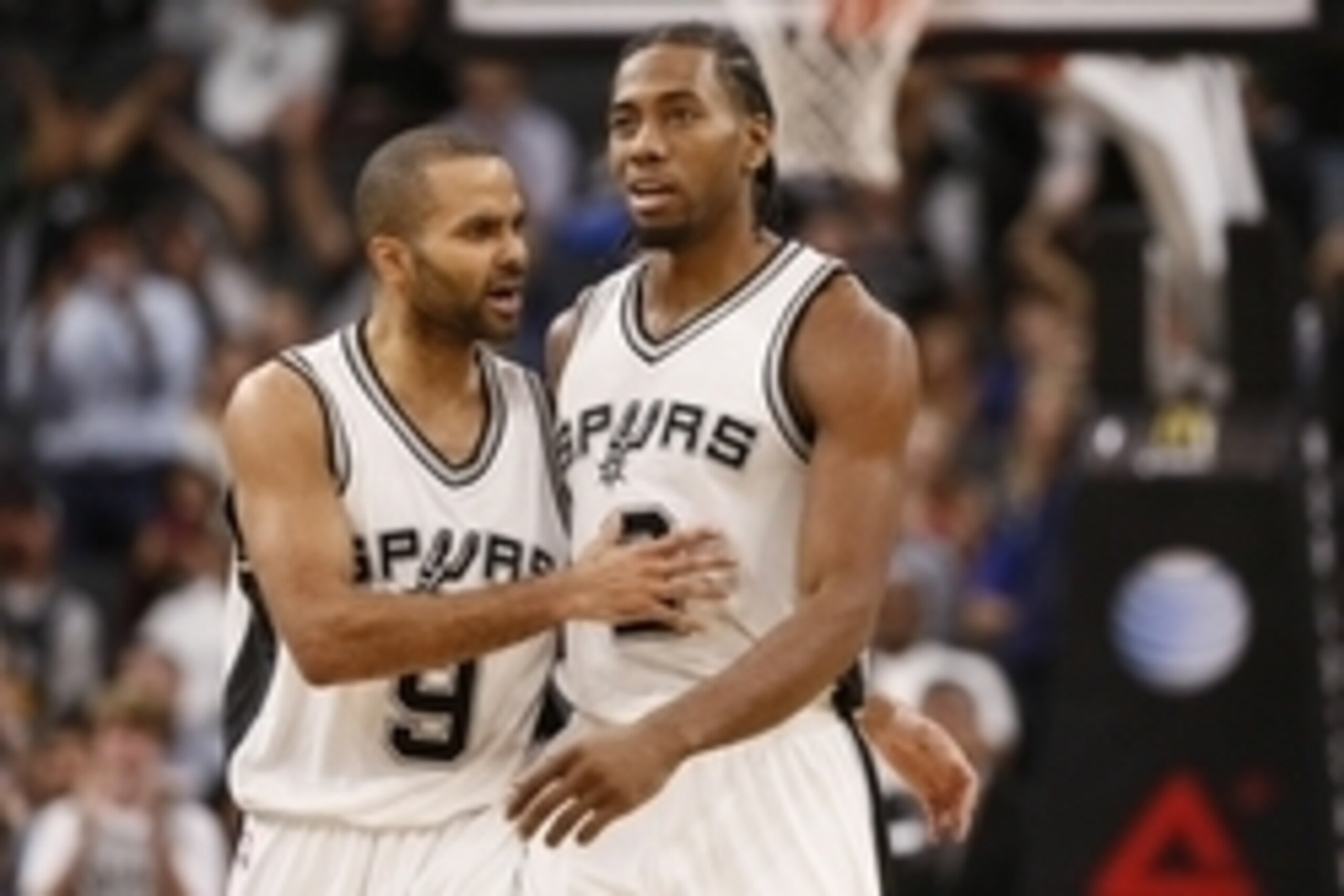 Nov 18, 2015; San Antonio, TX, USA; San Antonio Spurs point guard Tony Parker (9) embraces teammate Kawhi Leonard (2) after a three pointer against the Denver Nuggets during the second half at AT&T Center. Mandatory Credit: Soobum Im-USA TODAY Sports Nov 18, 2015; San Antonio, TX, USA; San Antonio Spurs point guard Tony Parker (9) embraces teammate Kawhi Leonard (2) after a three pointer against the Denver Nuggets during the second half at AT&T Center. Mandatory Credit: Soobum Im-USA TODAY Sports