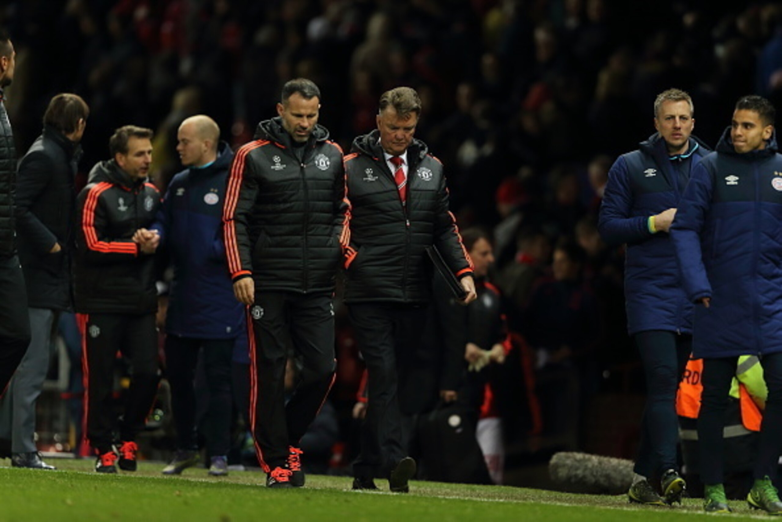 MANCHESTER, ENGLAND - NOVEMBER 25:  A dejected Ryan Giggs and Louis van Gaal the head coach / manager of Manchester United during the UEFA Champions League match between Manchester United FC and PSV Eindhoven at Old Trafford on November 25, 2015 in Manche