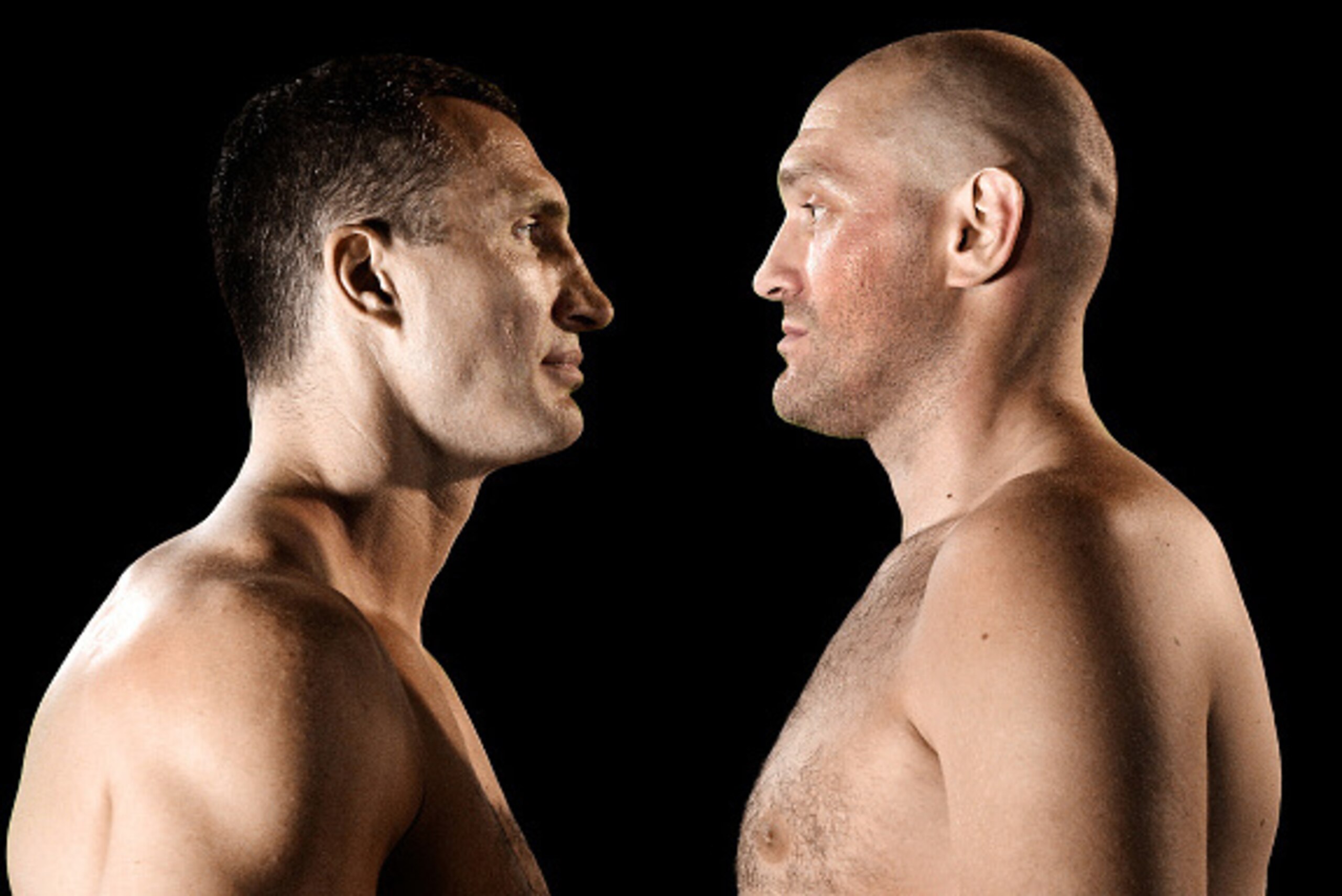 DUESSELDORF, GERMANY - JULY 21:  (EXCLUSIVE COVERAGE) Wladimir Klitschko (L) and Tyson Fury (R) face each other at Esprit-Arena on July 21, 2015 in Duesseldorf, Germany. The Heavyweight title clash between Klitschko and Fury will be held on 28th of Novemb