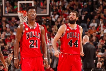 PORTLAND, OR - NOVEMBER 24: Jimmy Butler #21 and Nikola Mirotic #44 of the Chicago Bulls looks on during the game against the Portland Trail Blazers on November 24, 2015 at the Moda Center Arena in Portland, Oregon. NOTE TO USER: User expressly acknowledg