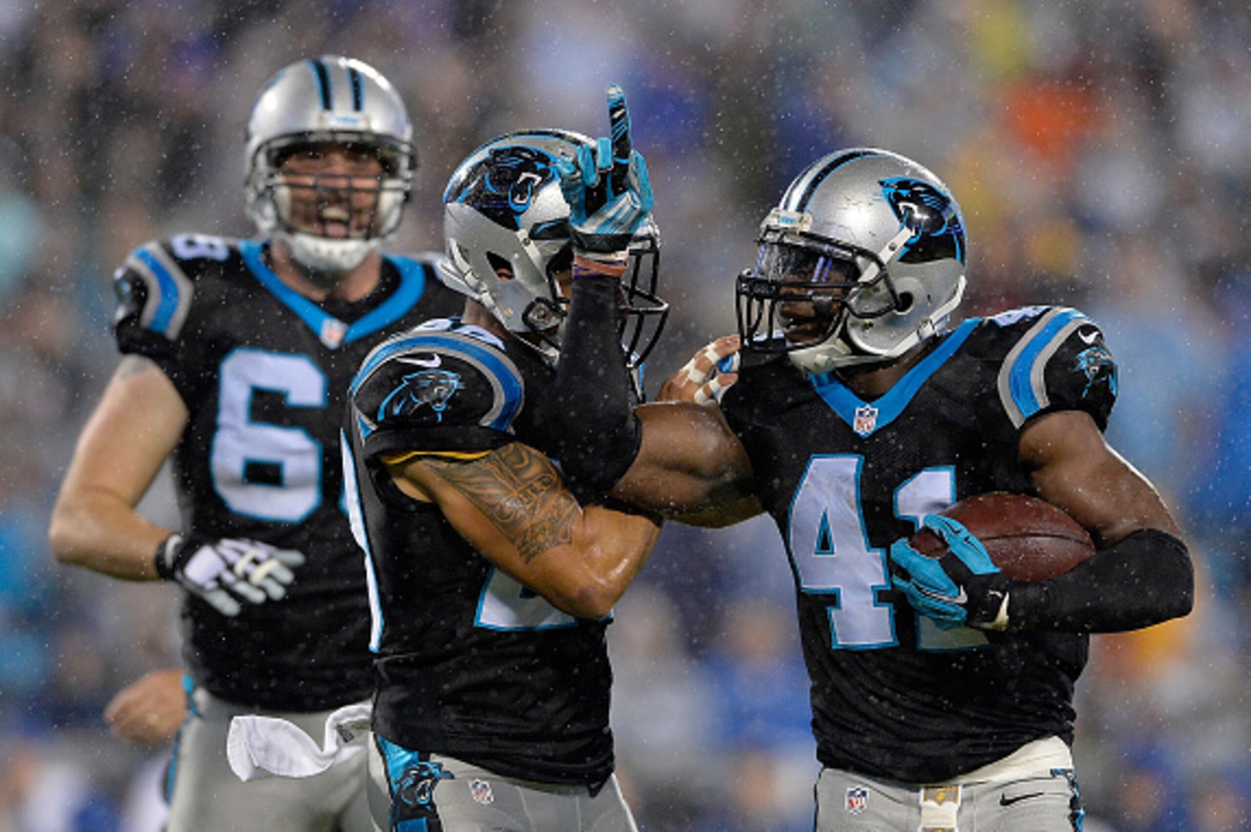 CHARLOTTE, NC - NOVEMBER 02:  Roman Harper #41 and Kurt Coleman #20 of the Carolina Panthers celebrate a turnover against the Indianapolis Colts in the 1st quarter during their game at Bank of America Stadium on November 2, 2015 in Charlotte, North Caroli