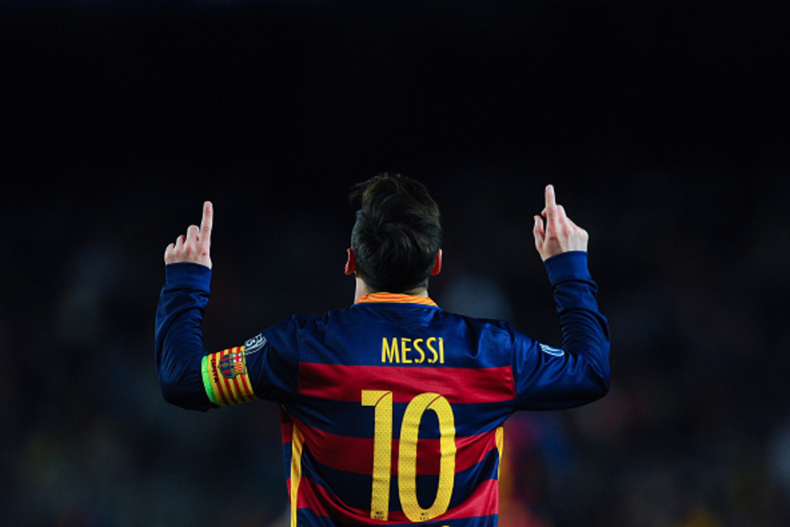 BARCELONA, SPAIN - NOVEMBER 24:  Lionel Messi of FC Barcelona celebrates after scoring his team's second goal during the UEFA Champions League Group E match between FC Barcelona and AS Roma at Camp Nou stadium on November 24, 2015 in Barcelona, Spain.  (P