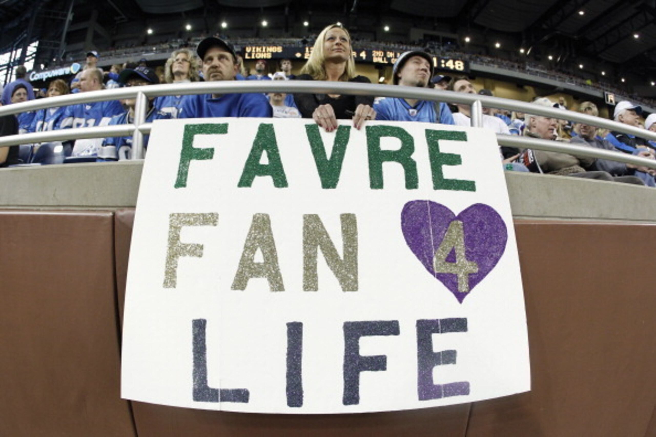 DETROIT, MI - JANUARY 2: A fan holds a sign showing support for Brett Favre of the Minnesota Vikings during the game against the Detroit Lions at Ford Field on January 2, 2011 in Detroit, Michigan. The Lions defeated the Vikings 20-13. (Photo by Joe Robbi