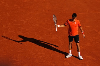 PARIS, FRANCE - JUNE 07:  Novak Djokovic of Serbia reacts  in the Men's Singles Final against Stanislas Wawrinka of Switzerland on day fifteen of the 2015 French Open at Roland Garros on June 7, 2015 in Paris, France.  (Photo by Clive Brunskill/Getty Imag