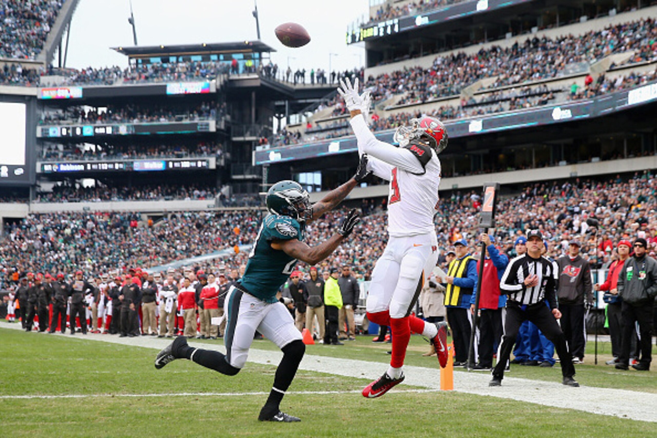 PHILADELPHIA, PA - NOVEMBER 22: Mike Evans #13 of the Tampa Bay Buccaneers makes a touchdown catch against Nolan Carroll #23 of the Philadelphia Eagles in the first quarter at Lincoln Financial Field on November 22, 2015 in Philadelphia, Pennsylvania. ( PHILADELPHIA, PA - NOVEMBER 22: Mike Evans #13 of the Tampa Bay Buccaneers makes a touchdown catch against Nolan Carroll #23 of the Philadelphia Eagles in the first quarter at Lincoln Financial Field on November 22, 2015 in Philadelphia, Pennsylvania. (