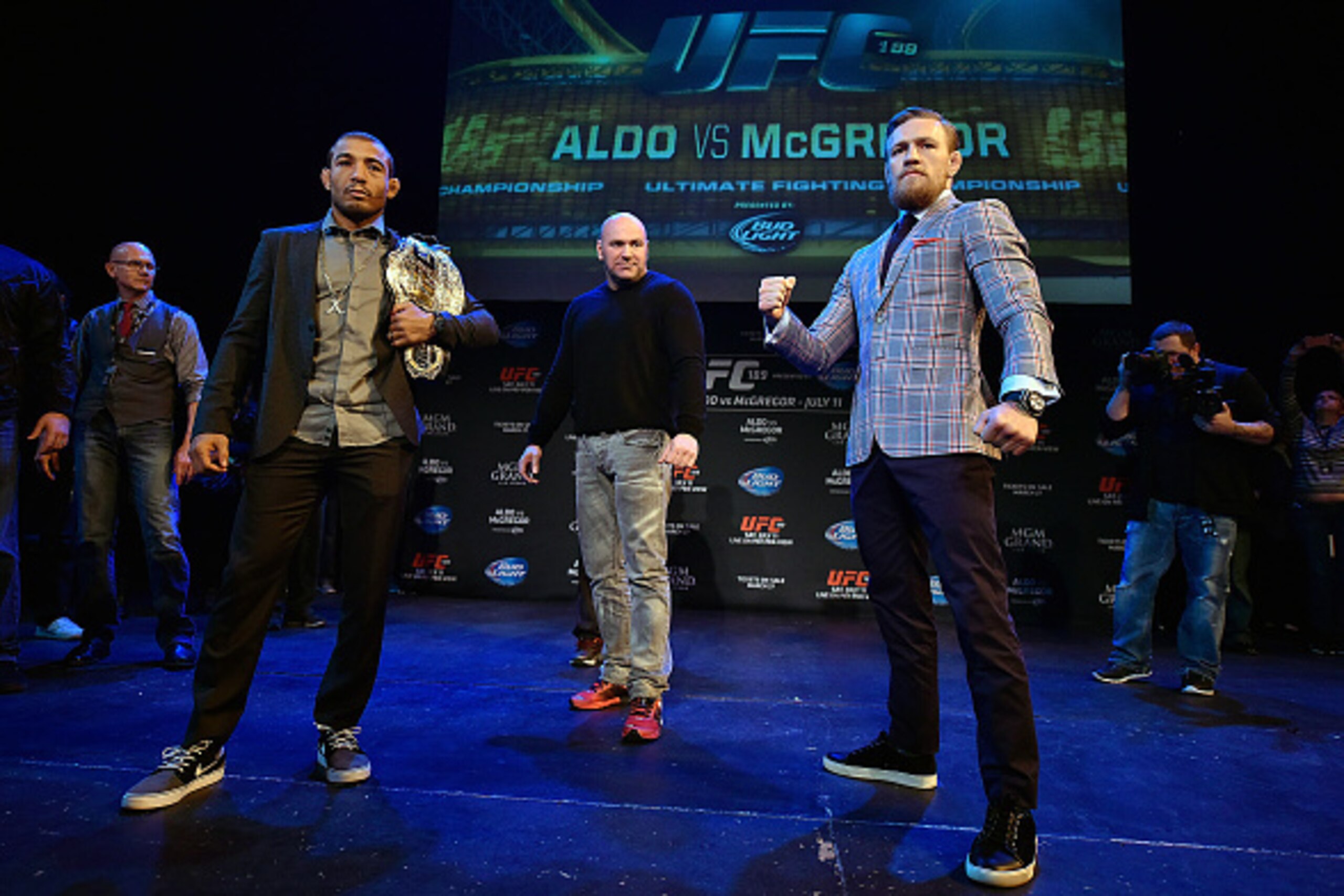 DORCHESTER, MA - MARCH 25: (L-R) UFC Featherweight Champion Jose Aldo, UFC President Dana White and title challenger Conor McGregor of Ireland interact with the media and fans during the UFC 189 World Championship Press Tour press conference inside The S DORCHESTER, MA - MARCH 25: (L-R) UFC Featherweight Champion Jose Aldo, UFC President Dana White and title challenger Conor McGregor of Ireland interact with the media and fans during the UFC 189 World Championship Press Tour press conference inside The S