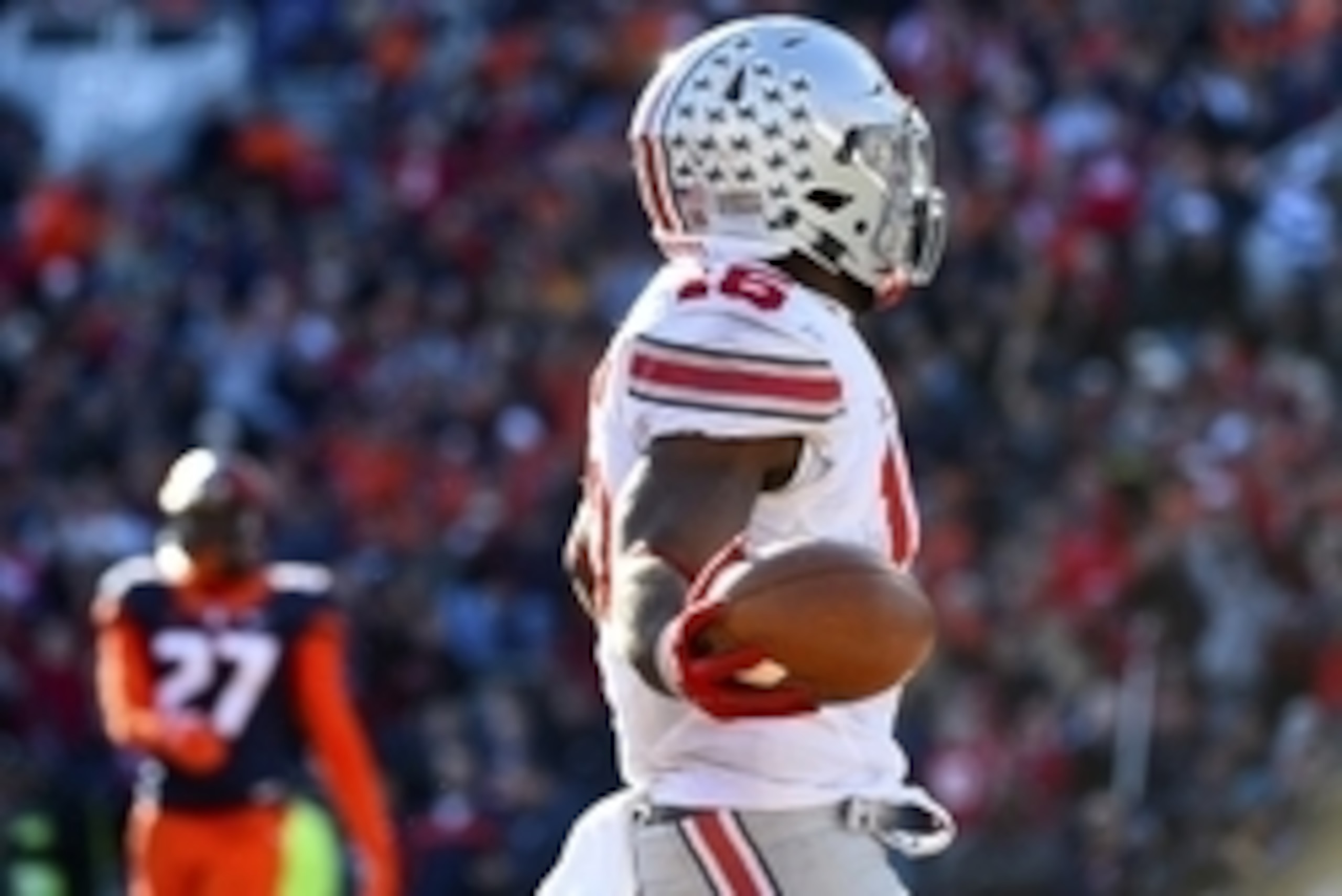Nov 14, 2015; Champaign, IL, USA; Ohio State Buckeyes running back Ezekiel Elliott (15) reacts after scoring a touchdown against the Illinois Fighting Illini during the fourth quarter at Memorial Stadium. Ohio State defats Illinois 28-3. Mandatory Credit:
