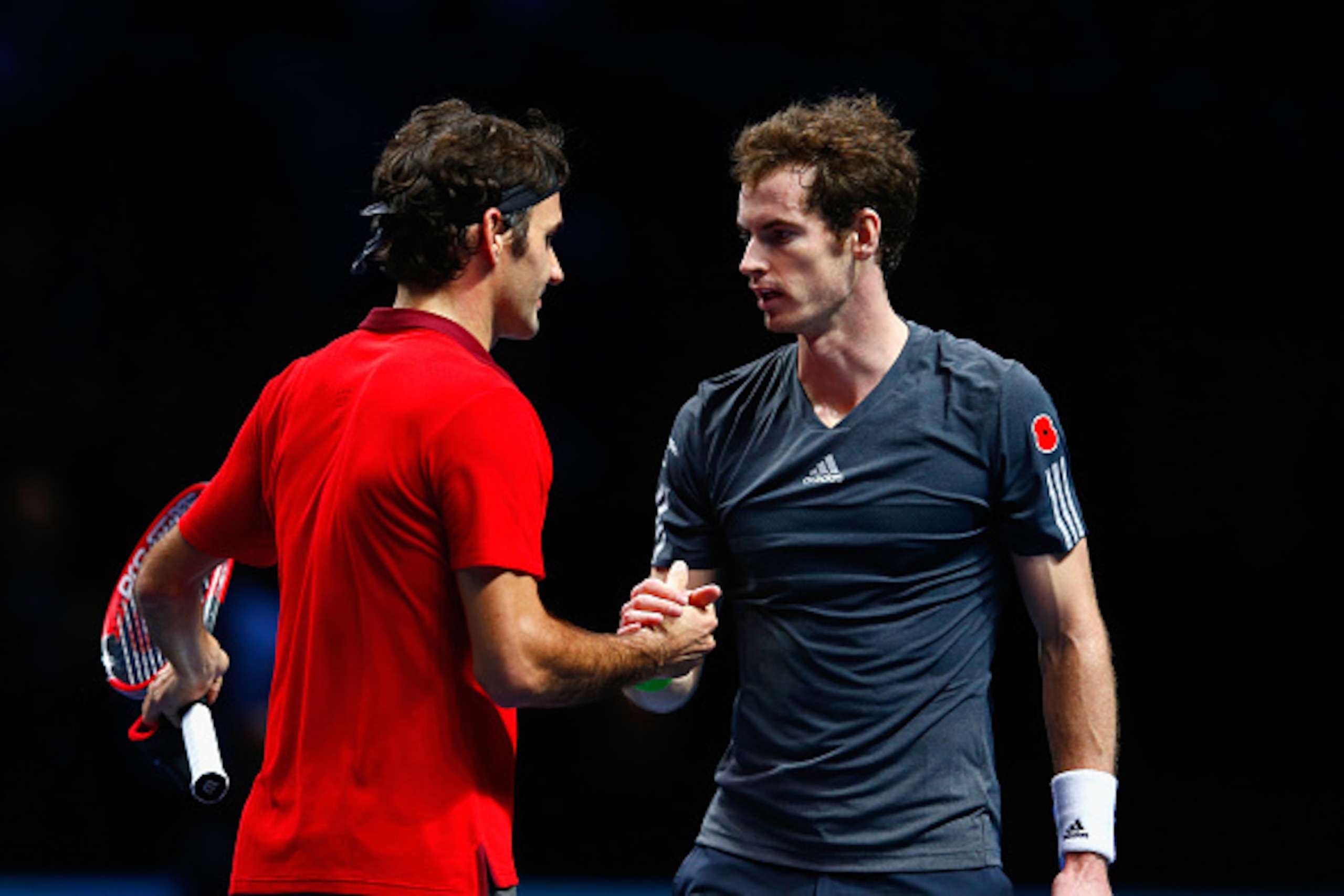LONDON, ENGLAND - NOVEMBER 13:  Andy Murray of Great Britain congratulates Roger Federer of Switzerland after the round robin singles match  on day five of the Barclays ATP World Tour Finals at O2 Arena on November 13, 2014 in London, England.  (Photo by 