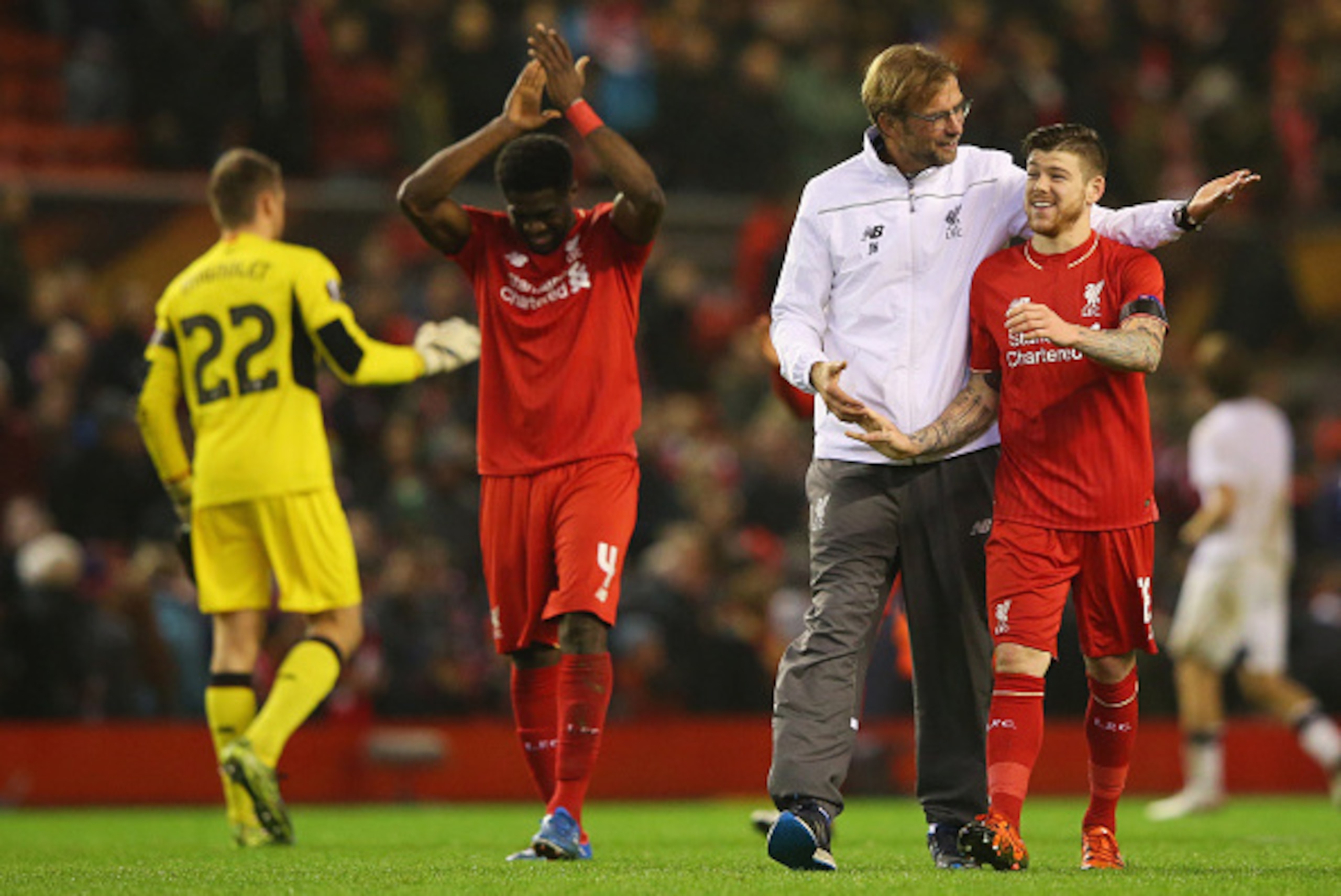 LIVERPOOL, ENGLAND - NOVEMBER 26:  Jurgen Klopp manager of Liverpool embraces Alberto Moreno of Liverpool after victory in the UEFA Europa League Group B match between Liverpool FC and FC Girondins de Bordeaux at Anfield on November 26, 2015 in Liverpool,