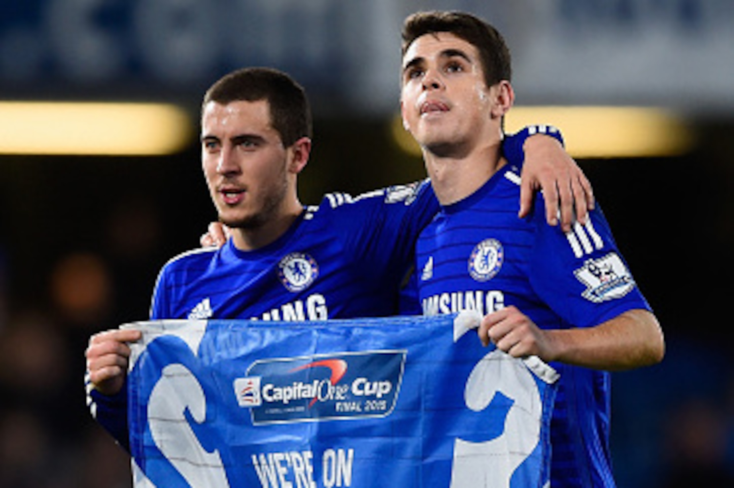 LONDON, ENGLAND - JANUARY 27:  Eden Hazard and Oscar of Chelsea celebrate victory after the Capital One Cup Semi-Final second leg between Chelsea and Liverpool at Stamford Bridge on January 27, 2015 in London, England.  (Photo by Mike Hewitt/Getty Images)