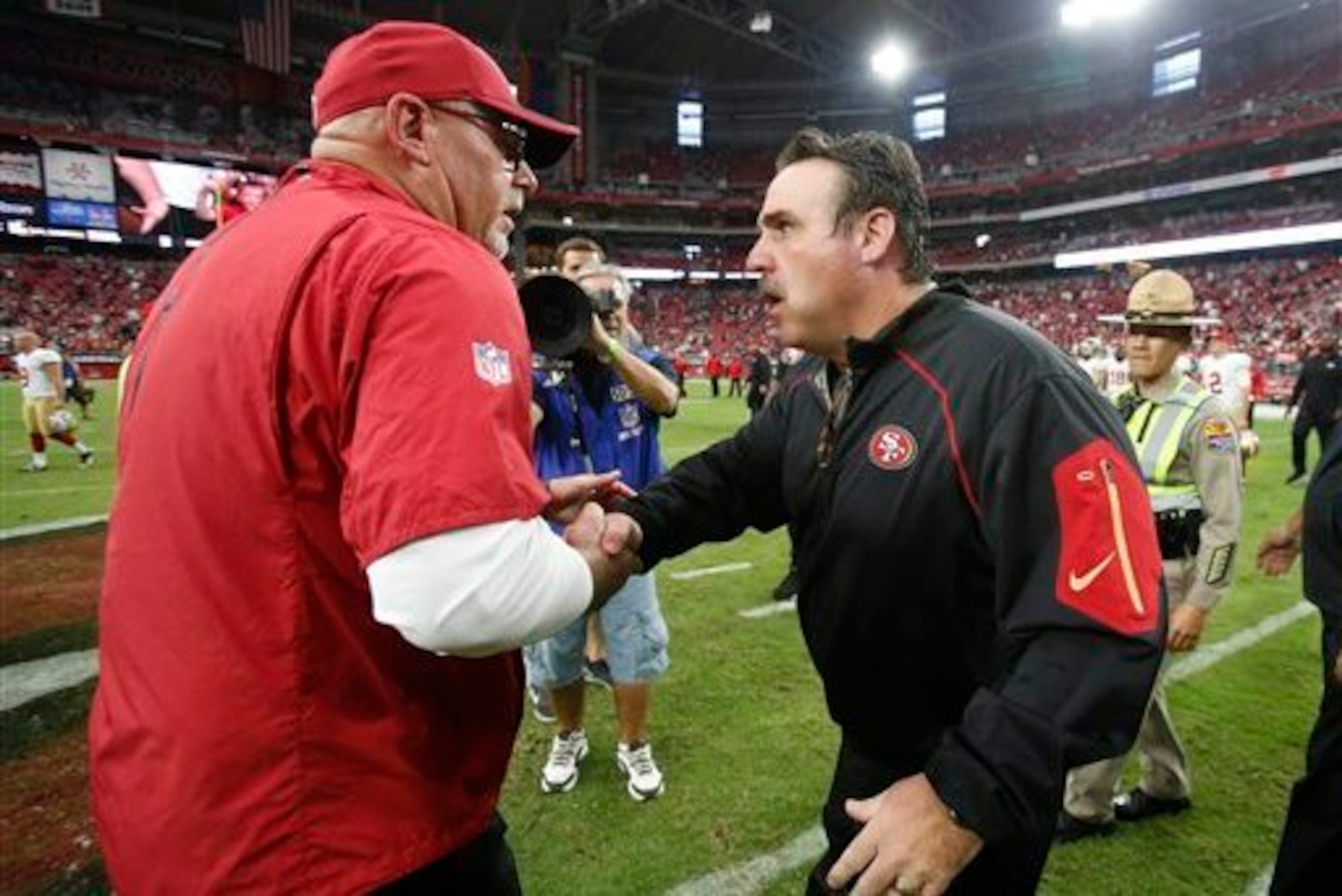 Cardinals head coach Bruce Arians (left) will look to go 2-0 over head coach Jim Tomsula (right) and the 49ers. Cardinals head coach Bruce Arians (left) will look to go 2-0 over head coach Jim Tomsula (right) and the 49ers.