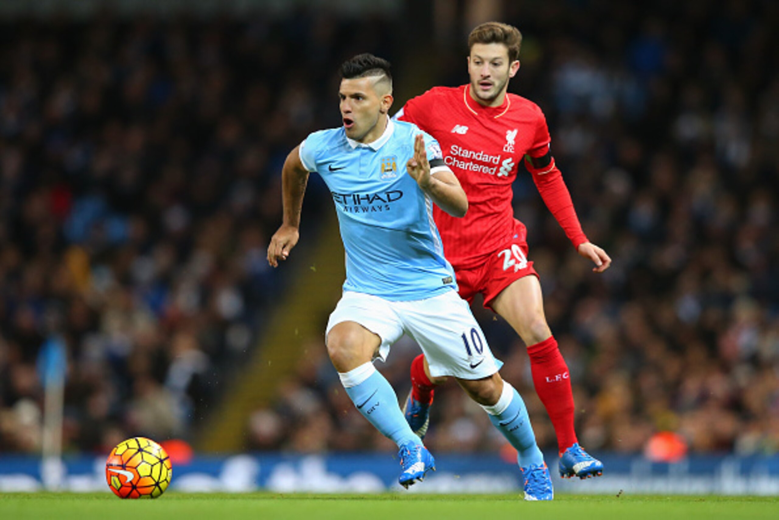 MANCHESTER, ENGLAND - NOVEMBER 21:  Sergio Aguero of Manchester City and Adam Lallana of Liverpool during the Barclays Premier League match between Manchester City and Liverpool at Etihad Stadium on November 21, 2015 in Manchester, England.  (Photo by Ale