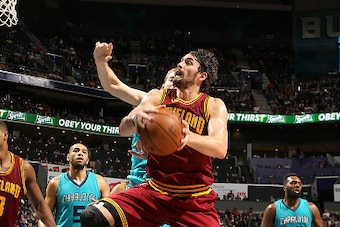 CHARLOTTE, NC - NOVEMBER 27: Kevin Love #0 of the Cleveland Cavaliers goes for the lay up during the game against the Charlotte Hornets on November 27, 2015 at Time Warner Cable Arena in Charlotte, North Carolina. NOTE TO USER: User expressly acknowledges
