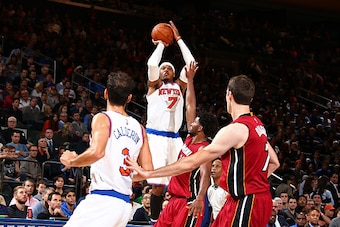 NEW YORK, NY - NOVEMBER 27:  Carmelo Anthony #7 of the New York Knicks shoots the ball against the Miami Heat on November 27, 2015 at Madison Square Garden in New York City, New York.  NOTE TO USER: User expressly acknowledges and agrees that, by download