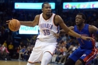 Nov 27, 2015; Oklahoma City, OK, USA; Oklahoma City Thunder forward Kevin Durant (35) drives to the basket against Detroit Pistons guard Reggie Jackson (1) during the fourth quarter at Chesapeake Energy Arena. Mandatory Credit: Mark D. Smith-USA TODAY Spo