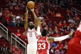 Nov 27, 2015; Houston, TX, USA; Houston Rockets shooting guard James Harden (13) shoots the ball over Philadelphia 76ers small forward Robert Covington (33) during the first half at Toyota Center. Mandatory Credit: Soobum Im-USA TODAY Sports