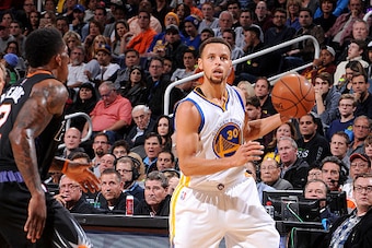 PHOENIX, AZ - NOVEMBER 27: Stephen Curry #30 of the Golden State Warriors handles the ball during the game against the Phoenix Suns on November 27, 2015 at U.S. Airways Center in Phoenix, Arizona. NOTE TO USER: User expressly acknowledges and agrees that,