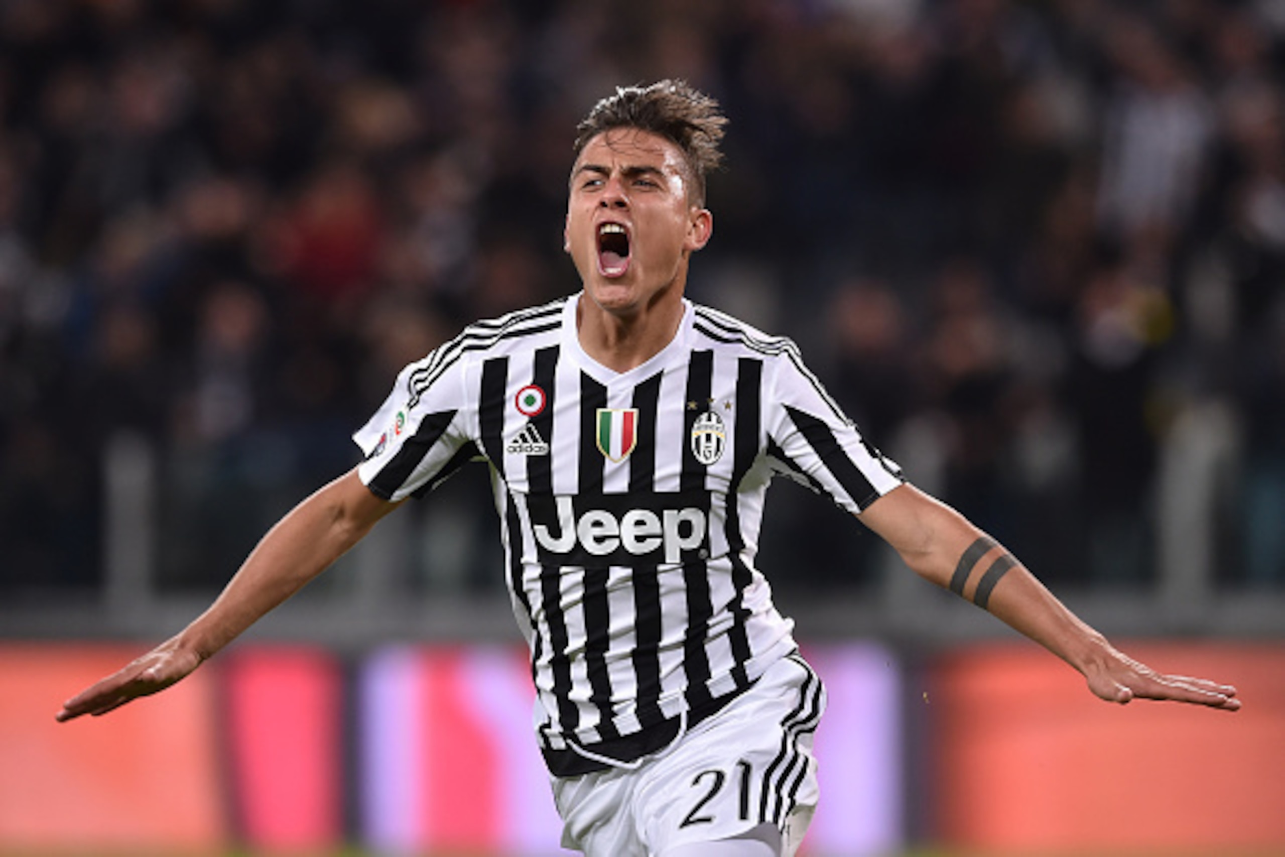 TURIN, ITALY - NOVEMBER 21:  Paulo Dybala of Juventus FC celebrates after scoring the opening goal during the Serie A match between Juventus FC and AC Milan at Juventus Arena on November 21, 2015 in Turin, Italy.  (Photo by Valerio Pennicino/Getty Images)