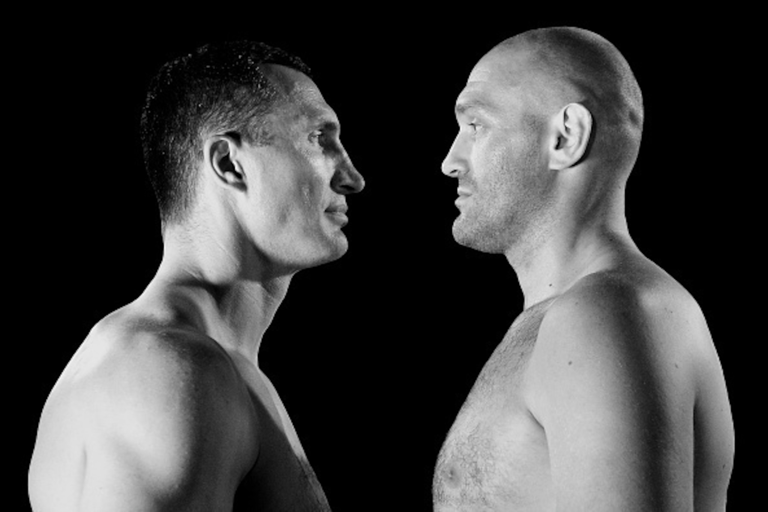 DUESSELDORF, GERMANY - JULY 21:  (EXCLUSIVE COVERAGE) (EDITORS NOTE: IMAGE HAS BEEN CONVERTED TO BLACK AND WHITE)  Wladimir Klitschko (L) and Tyson Fury (R) face each other at Esprit-Arena on July 21, 2015 in Duesseldorf, Germany. The Heavyweight title cl