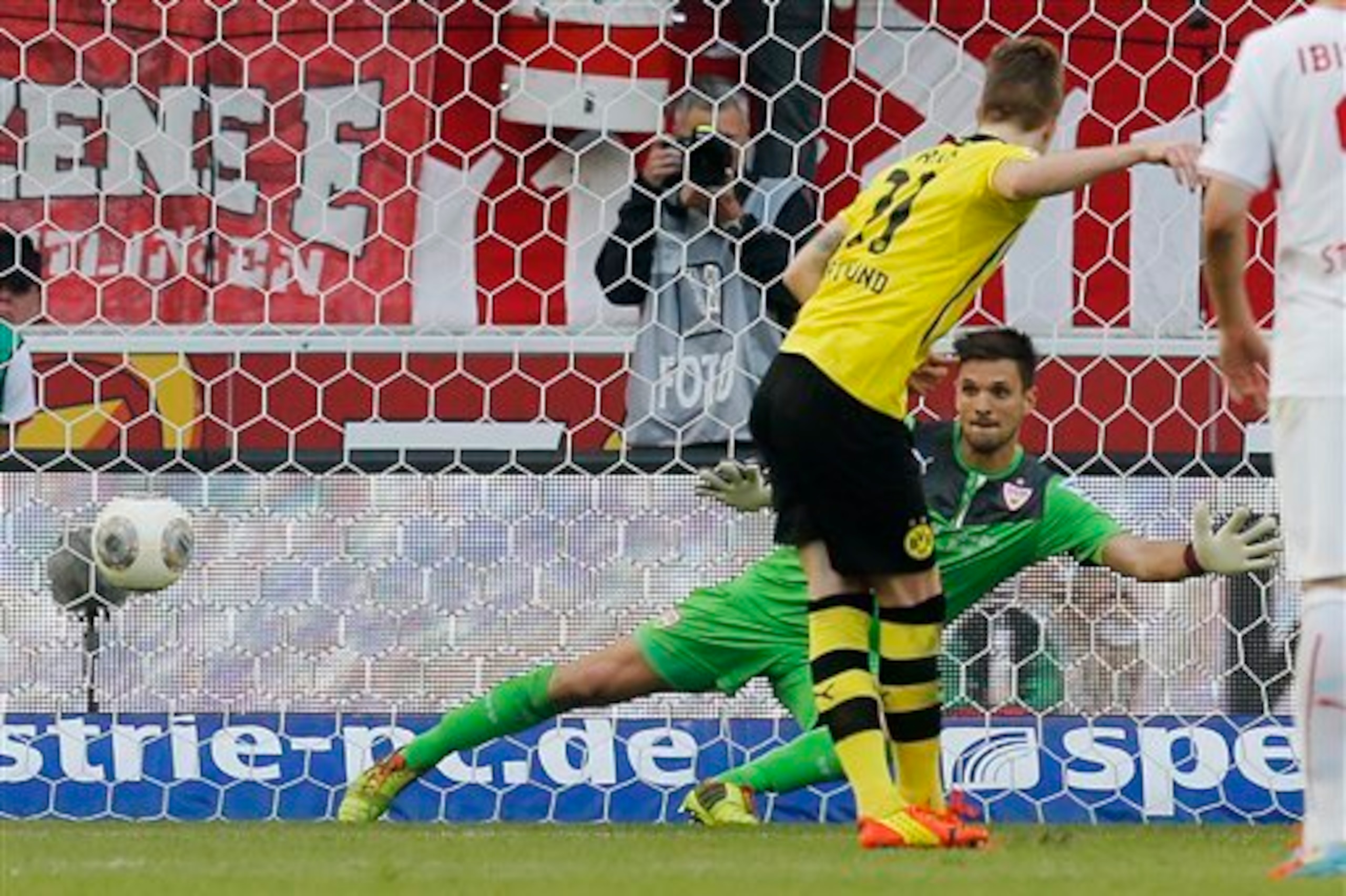 Marco Reus, pictured scoring from the spot against Stuttgart in 2014, should return for Dortmund.