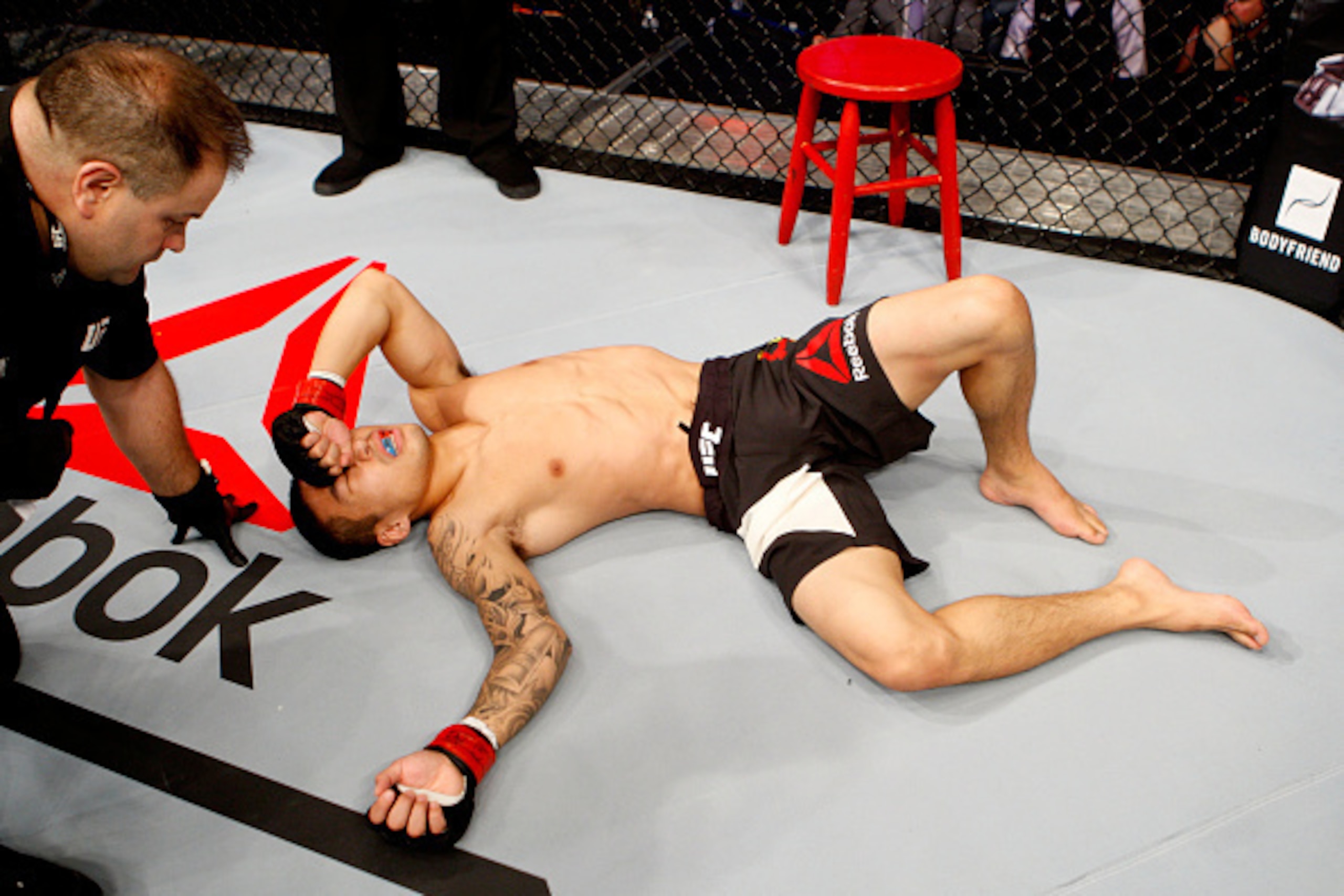 SEOUL, SOUTH KOREA - NOVEMBER 28:  Yao Zhikui of China after his TKO loss against Fredy Serrano of Colombia in their  flyweight bout during the UFC Fight Night at the Olympic Park Gymnastics Arena on November 28, 2015 in Seoul, South Korea. (Photo by Mitc