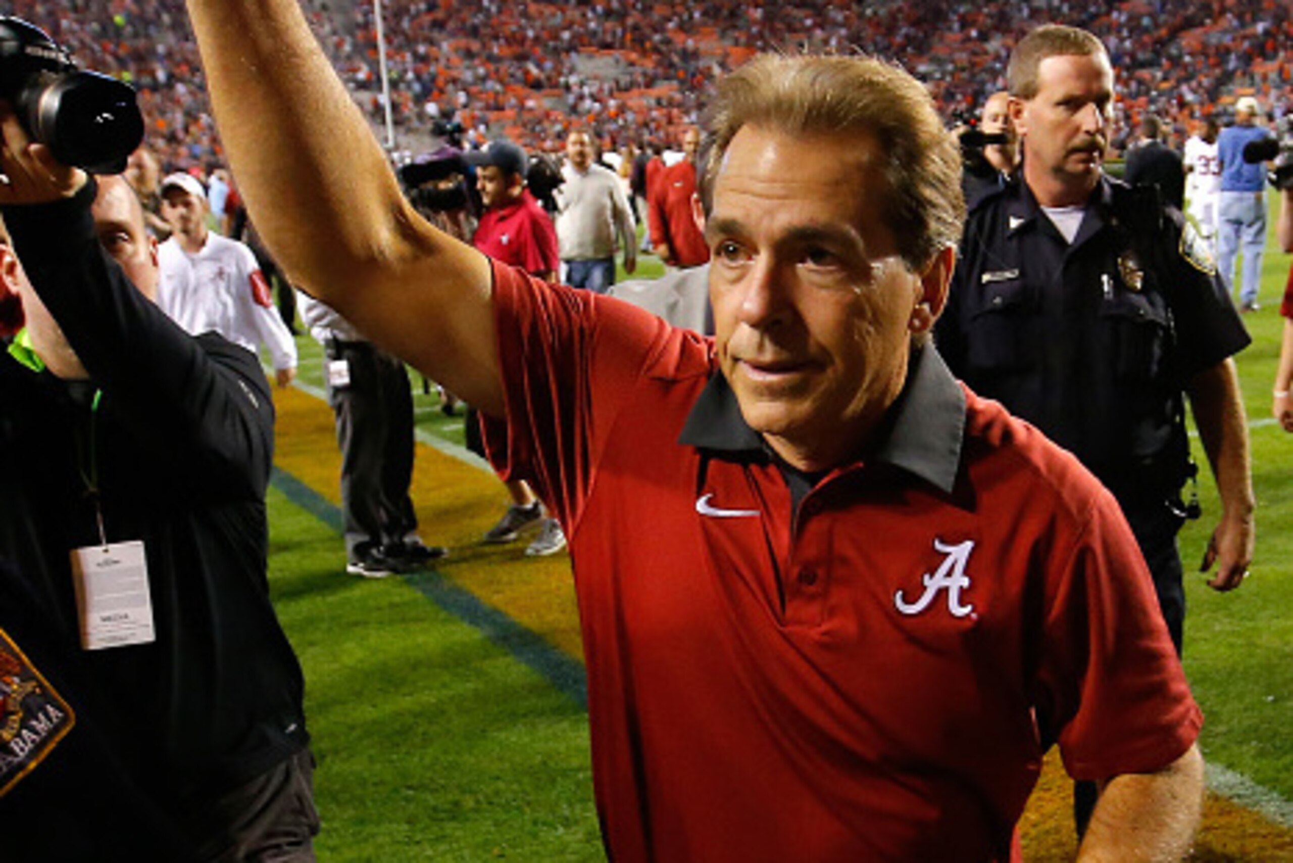 AUBURN, AL - NOVEMBER 28:  Head coach Nick Saban of the Alabama Crimson Tide runs off the field after their 29-13 win over the Auburn Tigers at Jordan Hare Stadium on November 28, 2015 in Auburn, Alabama.  (Photo by Kevin C. Cox/Getty Images)