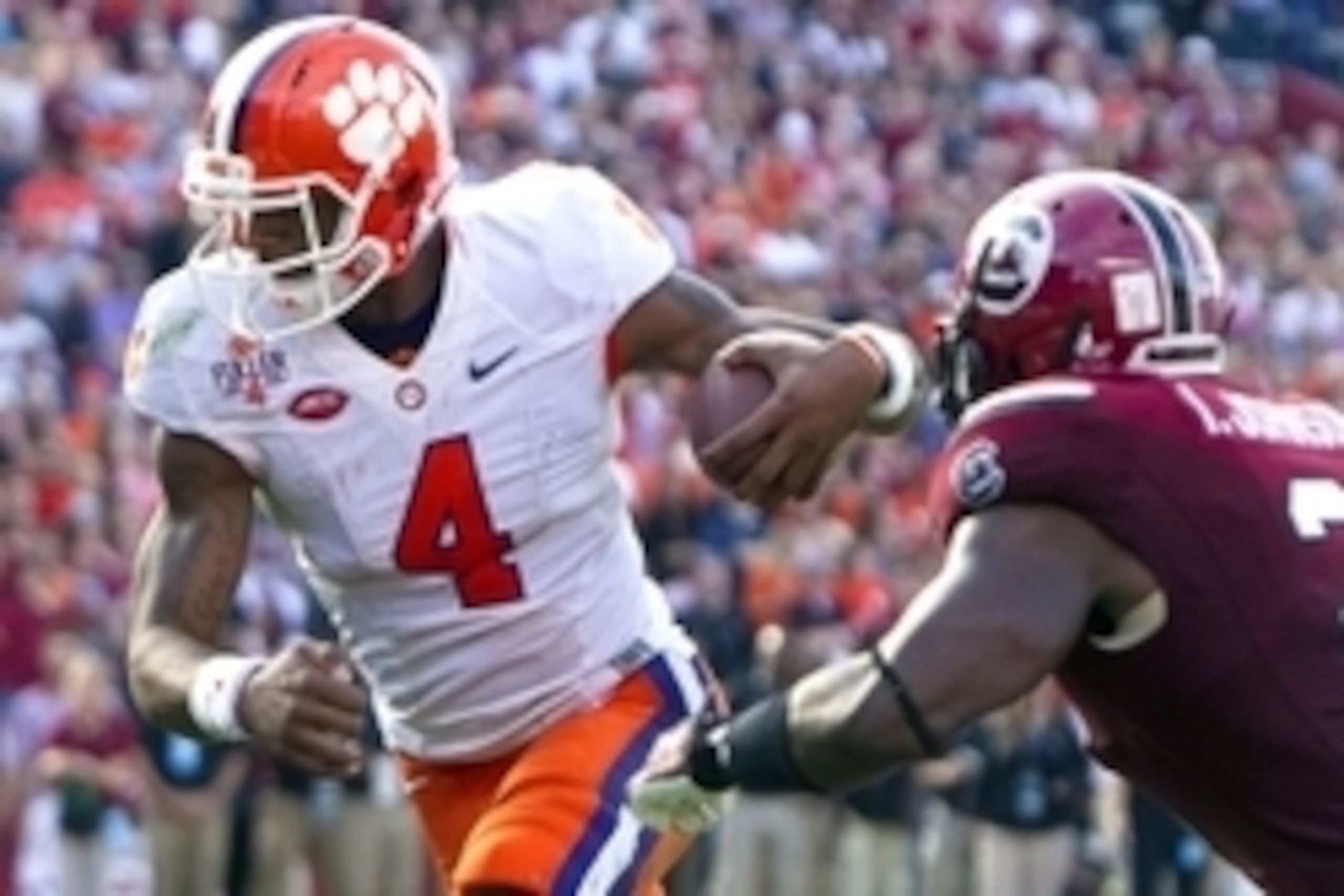 Nov 28, 2015; Columbia, SC, USA;  Clemson Tigers quarterback Deshaun Watson (4) carries for a touchdown during the second half against the South Carolina Gamecocks at Williams-Brice Stadium. Mandatory Credit: Joshua S. Kelly-USA TODAY Sports