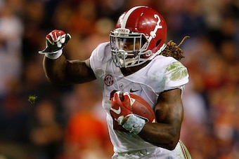 AUBURN, AL - NOVEMBER 28:  Derrick Henry #2 of the Alabama Crimson Tide rushes against the Auburn Tigers at Jordan Hare Stadium on November 28, 2015 in Auburn, Alabama.  (Photo by Kevin C. Cox/Getty Images)