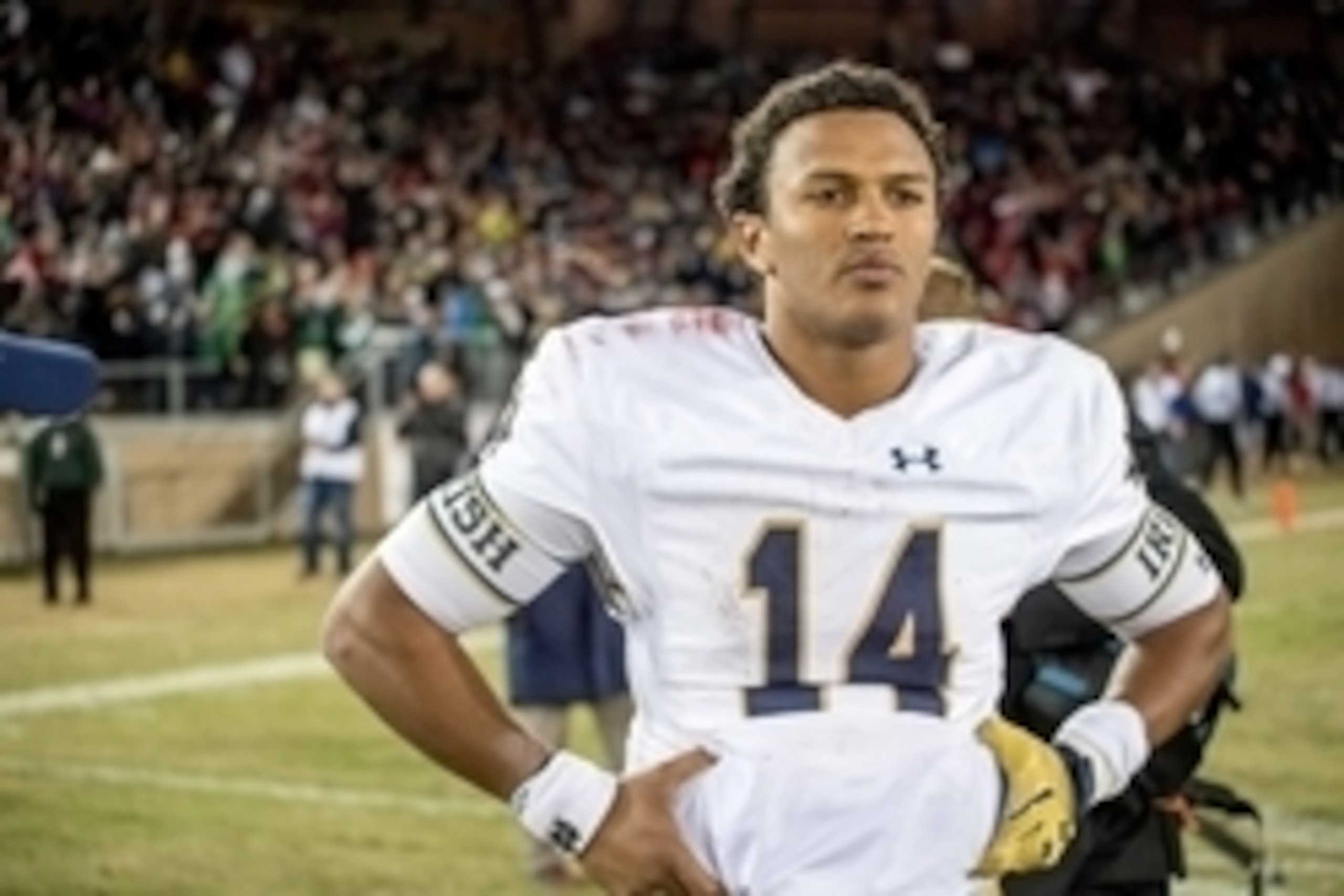 Nov 28, 2015; Stanford, CA, USA; Notre Dame Fighting Irish quarterback DeShone Kizer (14) reacts after the Stanford Cardinal defeated Notre Dame 38-36 at Stanford Stadium. Mandatory Credit: Matt Cashore-USA TODAY Sports