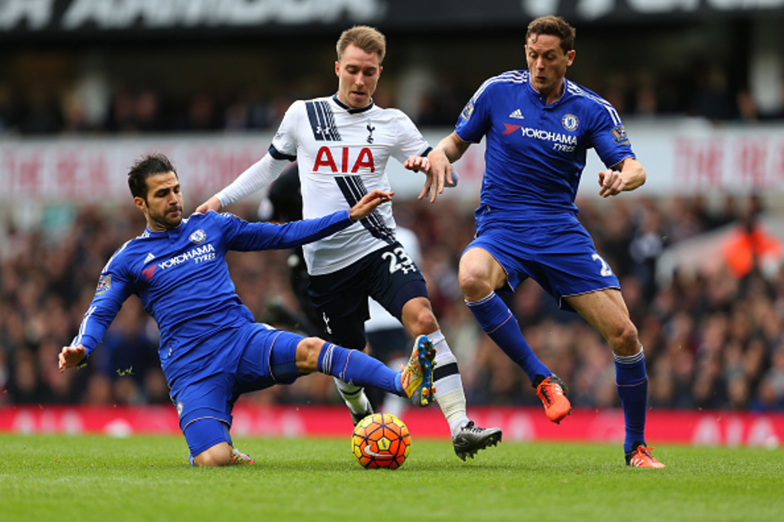 LONDON, ENGLAND - NOVEMBER 29: Cesc Fabregas and Nemanja Matic of Chelsea tackle Christian Eriksen of Tottenham Hotspur during the Barclays Premier League match between Tottenham Hotspur and Chelsea at White Hart Lane on November 29, 2015 in London, Engl LONDON, ENGLAND - NOVEMBER 29: Cesc Fabregas and Nemanja Matic of Chelsea tackle Christian Eriksen of Tottenham Hotspur during the Barclays Premier League match between Tottenham Hotspur and Chelsea at White Hart Lane on November 29, 2015 in London, Engl