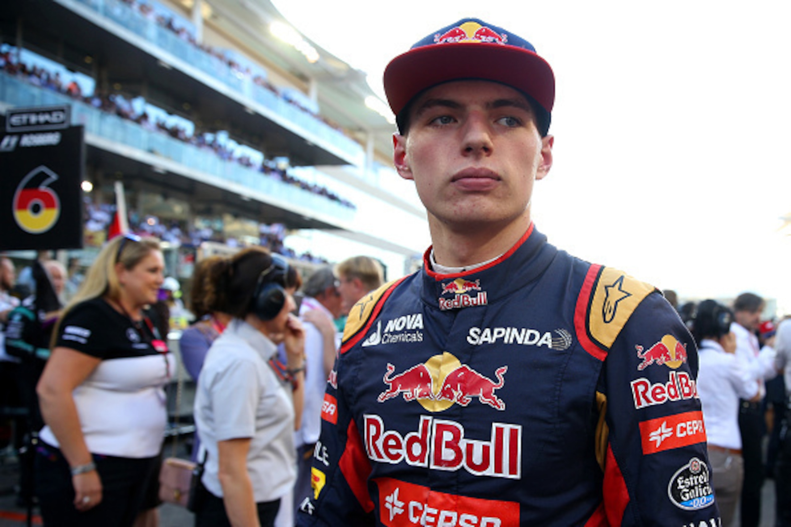 ABU DHABI, UNITED ARAB EMIRATES - NOVEMBER 29:  Max Verstappen of Netherlands and Scuderia Toro Rosso walks on the grid before the Abu Dhabi Formula One Grand Prix at Yas Marina Circuit on November 29, 2015 in Abu Dhabi, United Arab Emirates.  (Photo by M