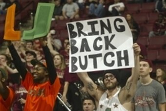Feb 1, 2015; Tallahassee, FL, USA; The Miami Hurricanes fans hold signs expressing his desire for the return of former Hurricanes football head coach Butch Davis (not pictured) in the second half against the Florida State Seminoles at the Donald L. Tucker