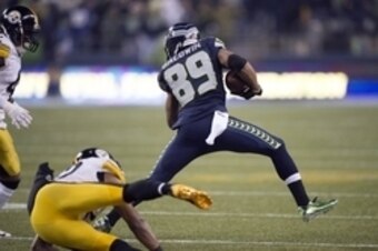Nov 29, 2015; Seattle, WA, USA; Seattle Seahawks wide receiver Doug Baldwin (89) catches a pass for a touchdown during the fourth quarter in a game against the Pittsburgh Steelers at CenturyLink Field. The Seahawks won 39-30. Mandatory Credit: Troy Wayryn